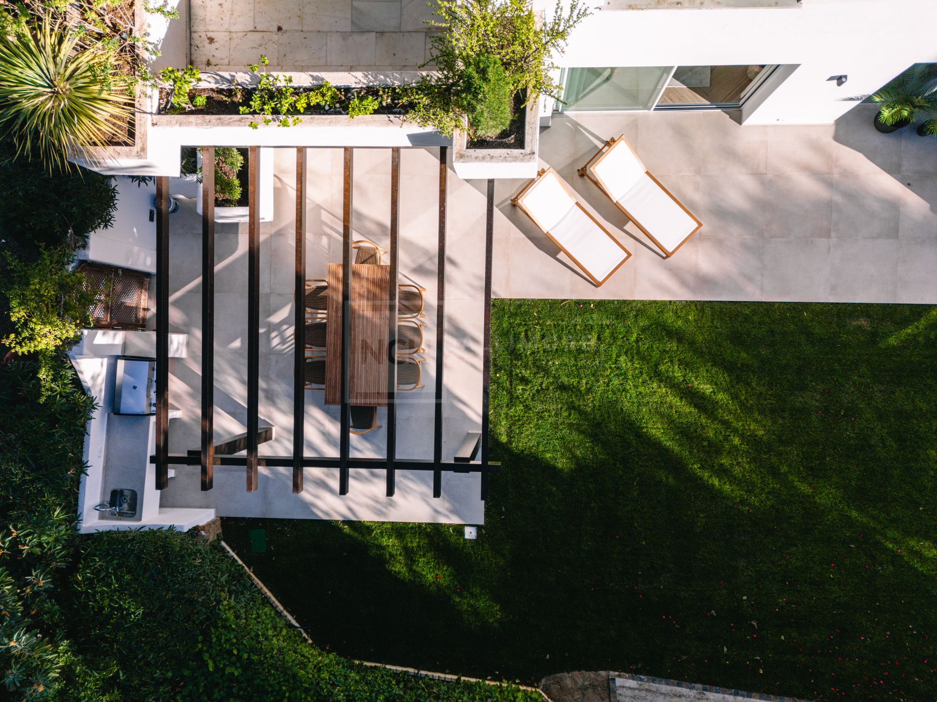 STUNNING 4-BEDROOM APARTMENT WITH OUTDOOR KITCHEN AND LUSH GARDEN ON THE GOLDEN MILE