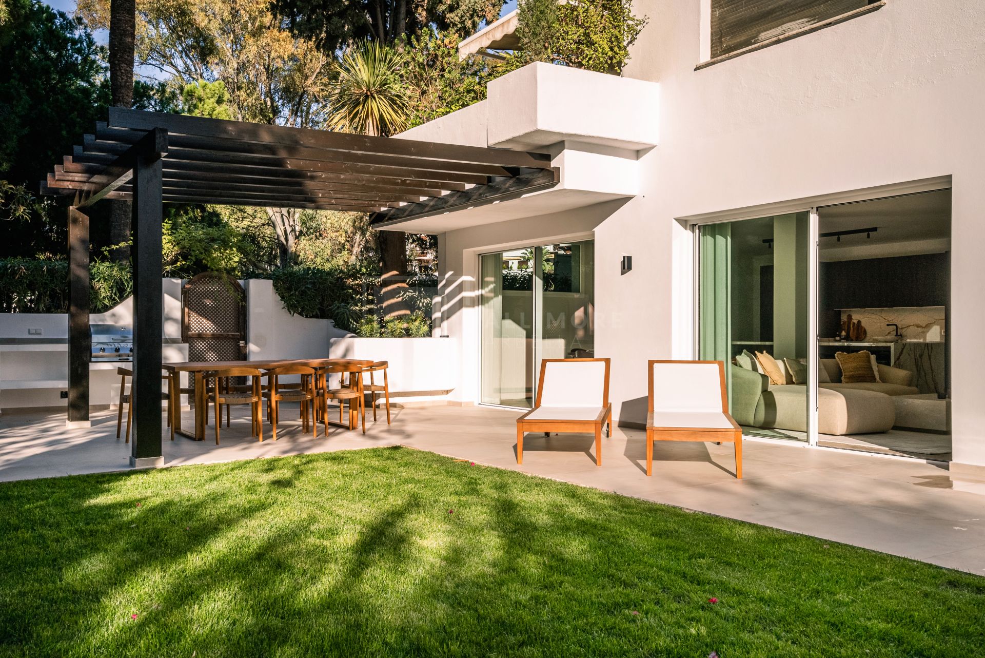 STUNNING 4-BEDROOM APARTMENT WITH OUTDOOR KITCHEN AND LUSH GARDEN ON THE GOLDEN MILE