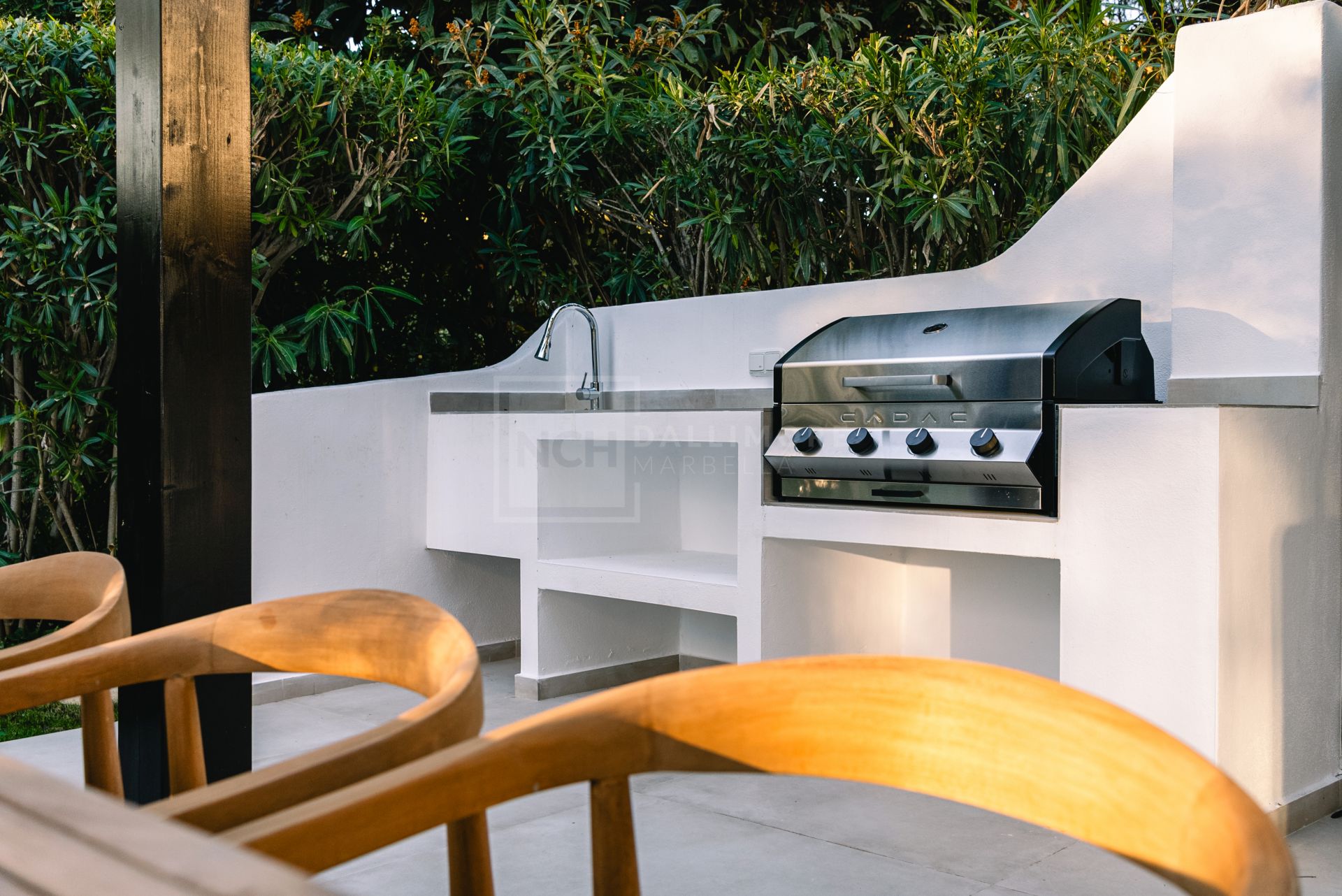 STUNNING 4-BEDROOM APARTMENT WITH OUTDOOR KITCHEN AND LUSH GARDEN ON THE GOLDEN MILE