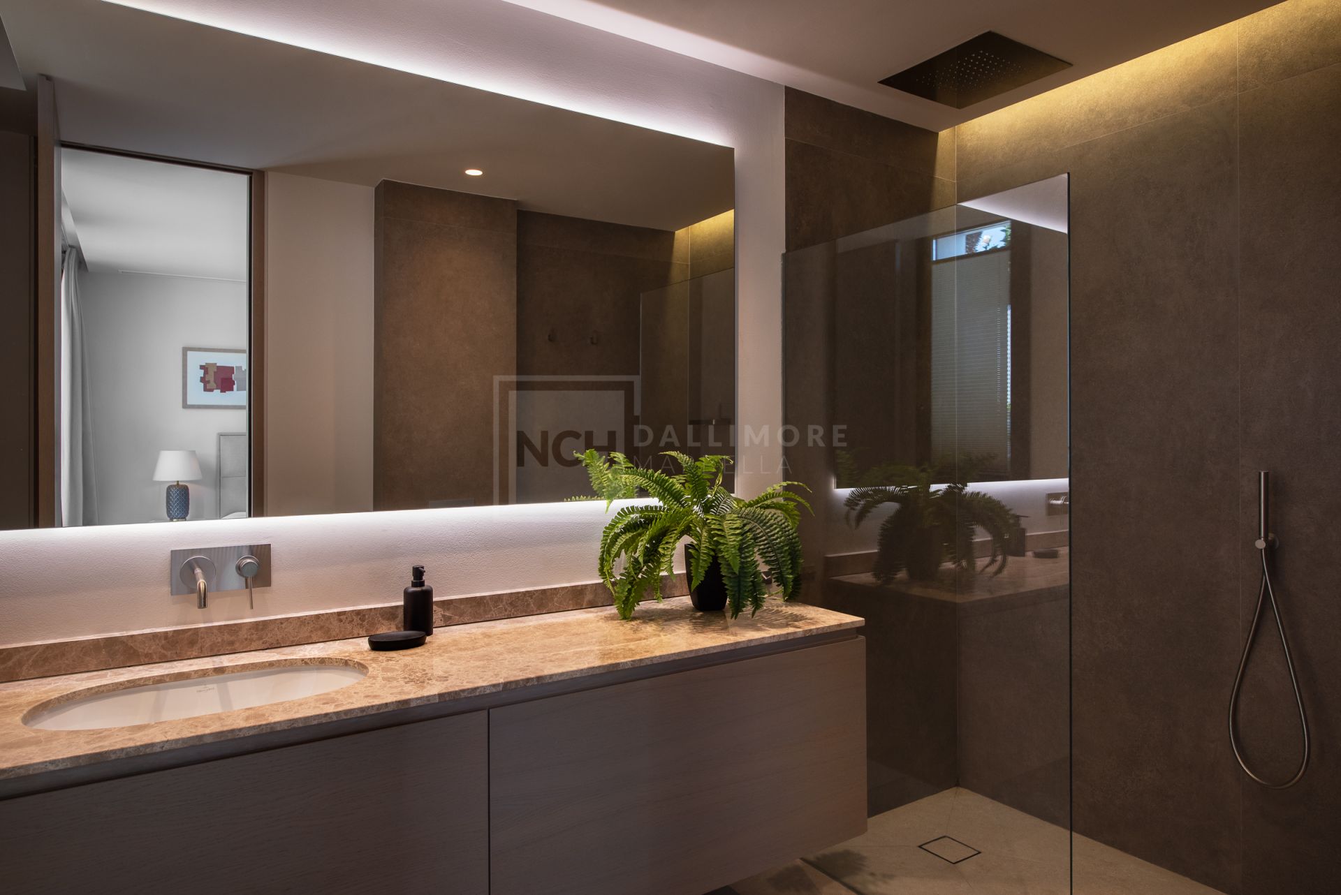 FIVE-BEDROOM DESIGNER VILLA WITH SEA, MOUNTAIN & GOLF VIEWS IN NUEVA ANDALUCIA
