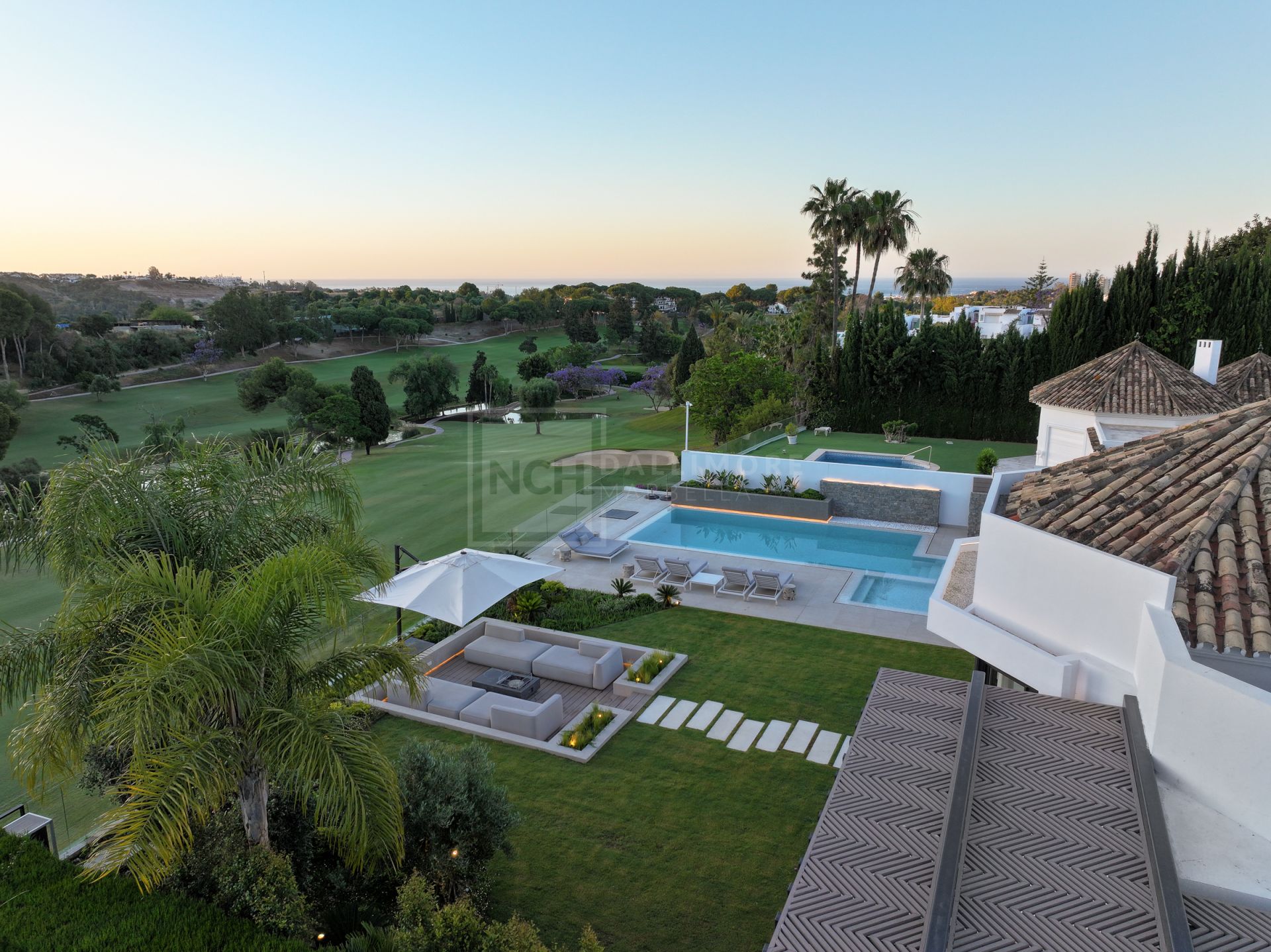 FIVE-BEDROOM DESIGNER VILLA WITH SEA, MOUNTAIN & GOLF VIEWS IN NUEVA ANDALUCIA