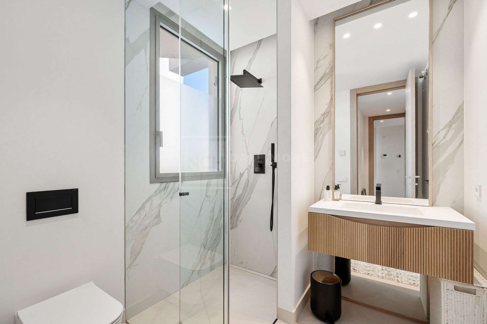 MODERN FOUR BEDROOM RESIDENCE WITH ROOFTOP SOLARIUM AND SEA VIEWS IN MARBELLA