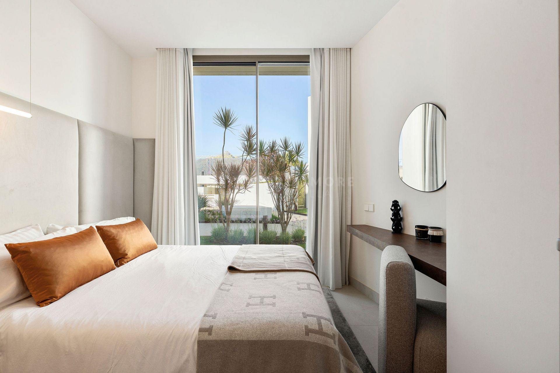 MODERN FOUR BEDROOM RESIDENCE WITH ROOFTOP SOLARIUM AND SEA VIEWS IN MARBELLA