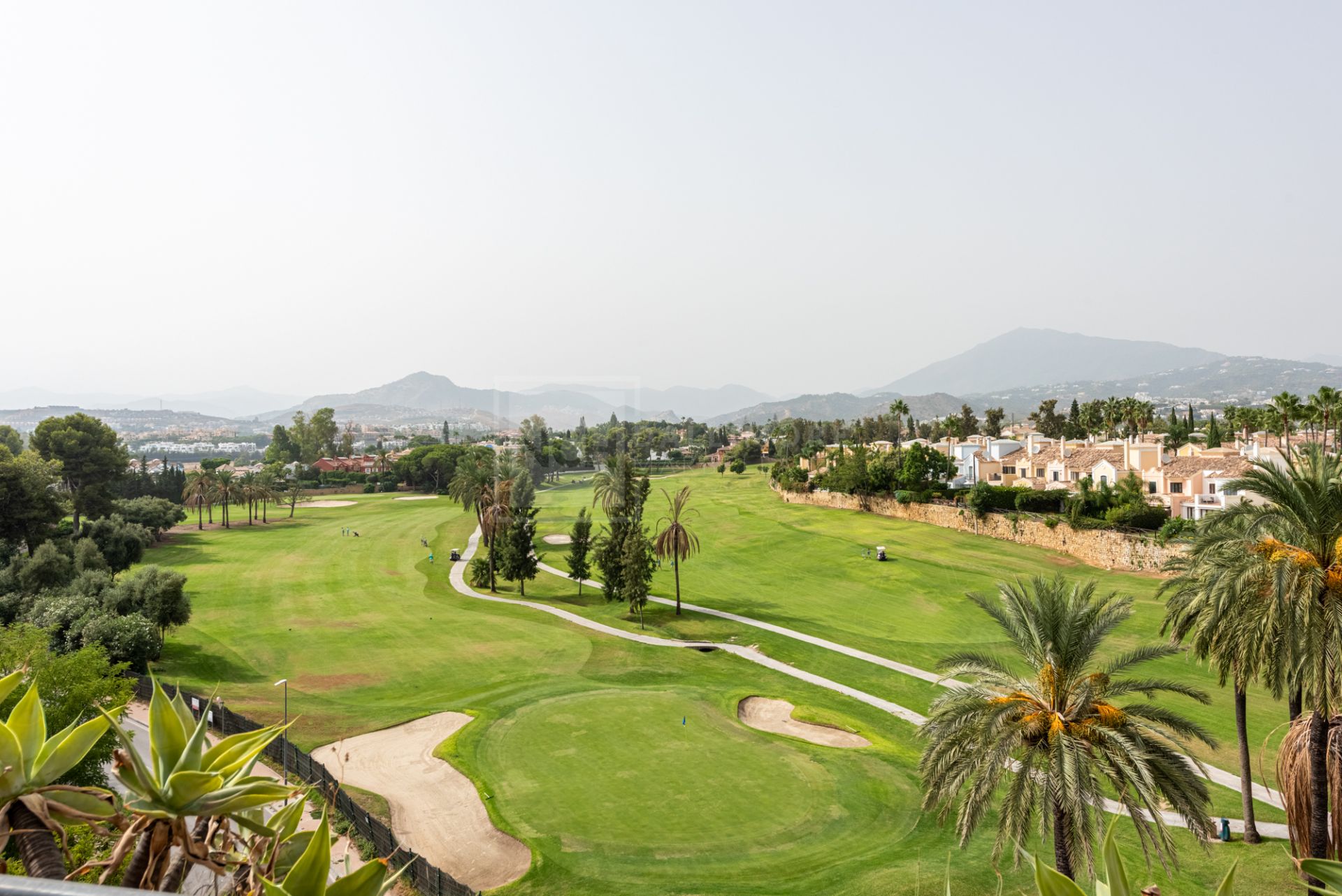 Frontline Golf Duplex Penthouse with Mountain Views in Guadalmina Alta