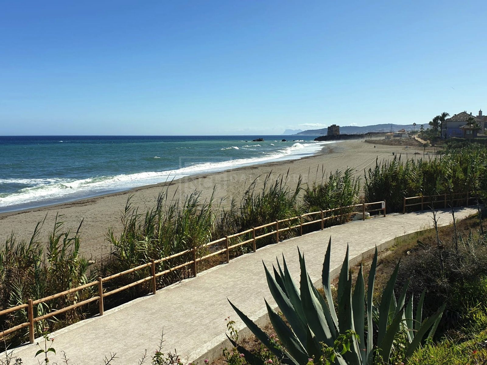 Exclusive South-Facing Beachfront Townhouse with Panoramic Sea Views