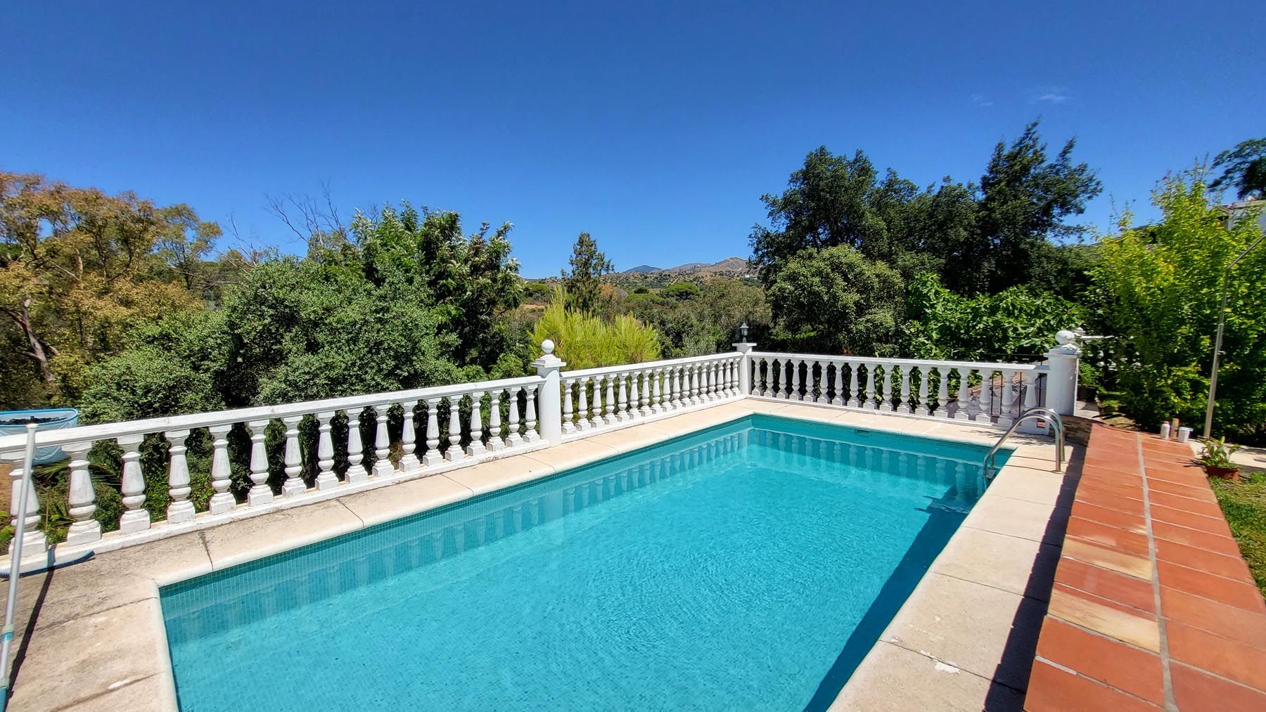 Elegant Elviria Villa with Panoramic Coastal Views, near the Beach.