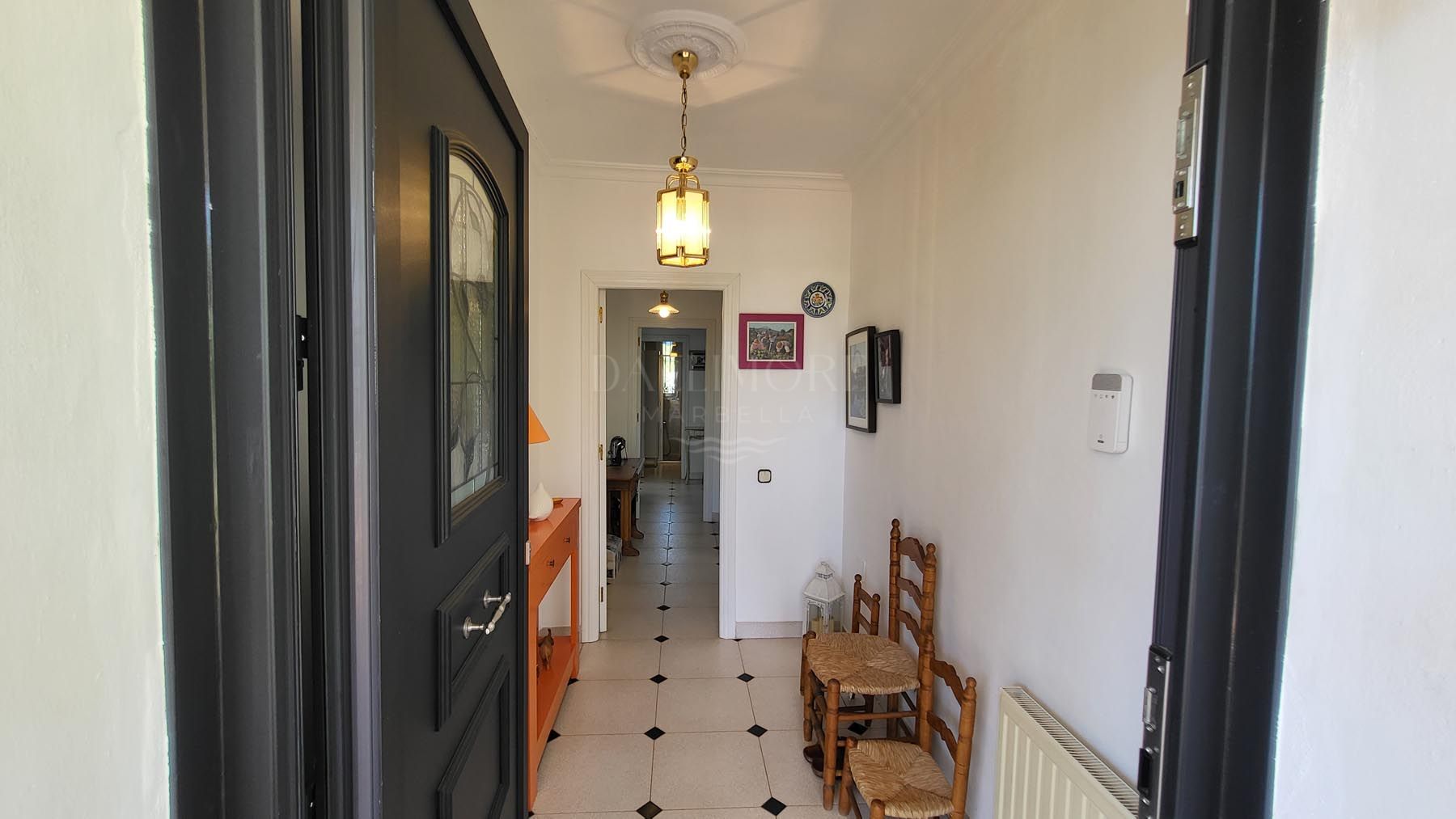 Elegant Elviria Villa with Panoramic Coastal Views, near the Beach.