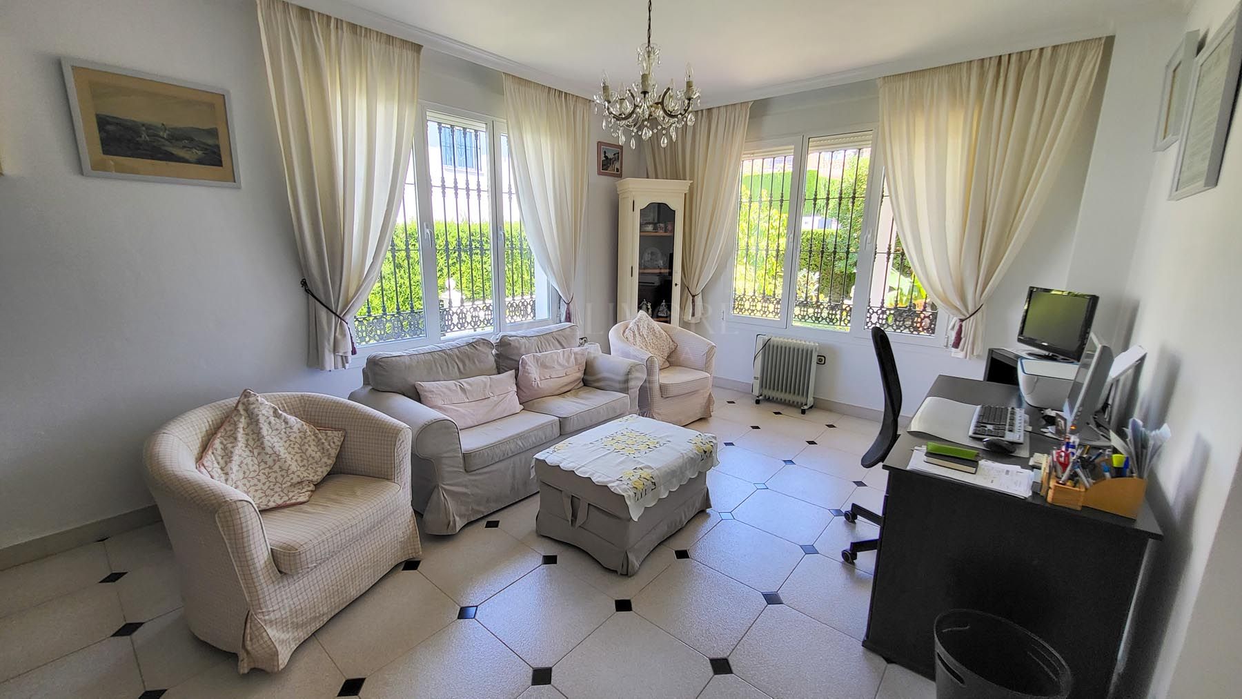 Elegant Elviria Villa with Panoramic Coastal Views, near the Beach.