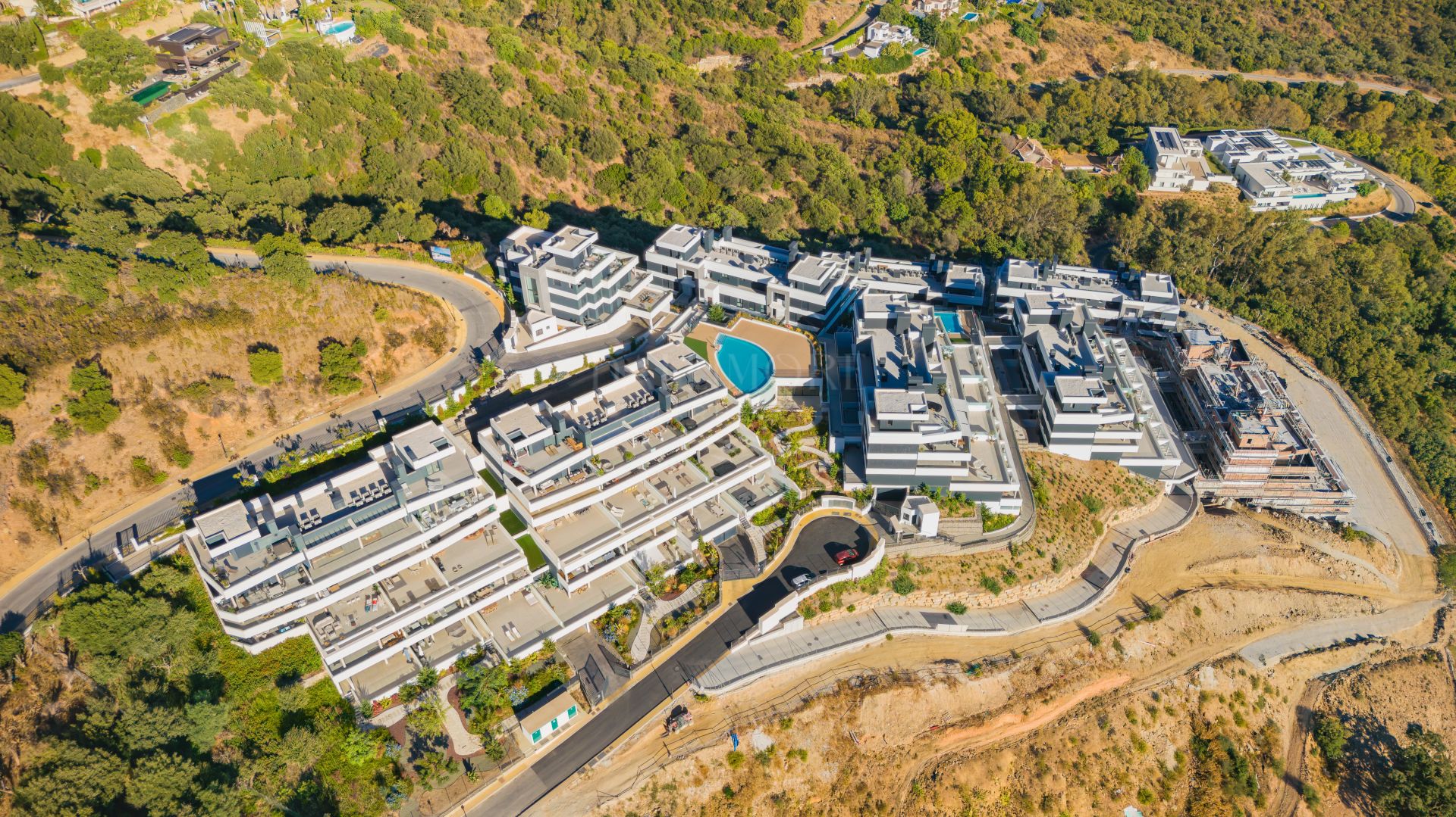 Beautifully designed, two-bedroom ground-floor apartment located in the sought-after Medblue community of Altos de Los Monteros, Marbella