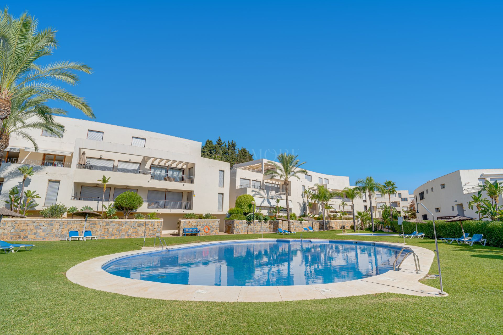 Bright and spacious elevated ground floor apartment in the sought-after gated community of Lomas de Los Monteros, Marbella