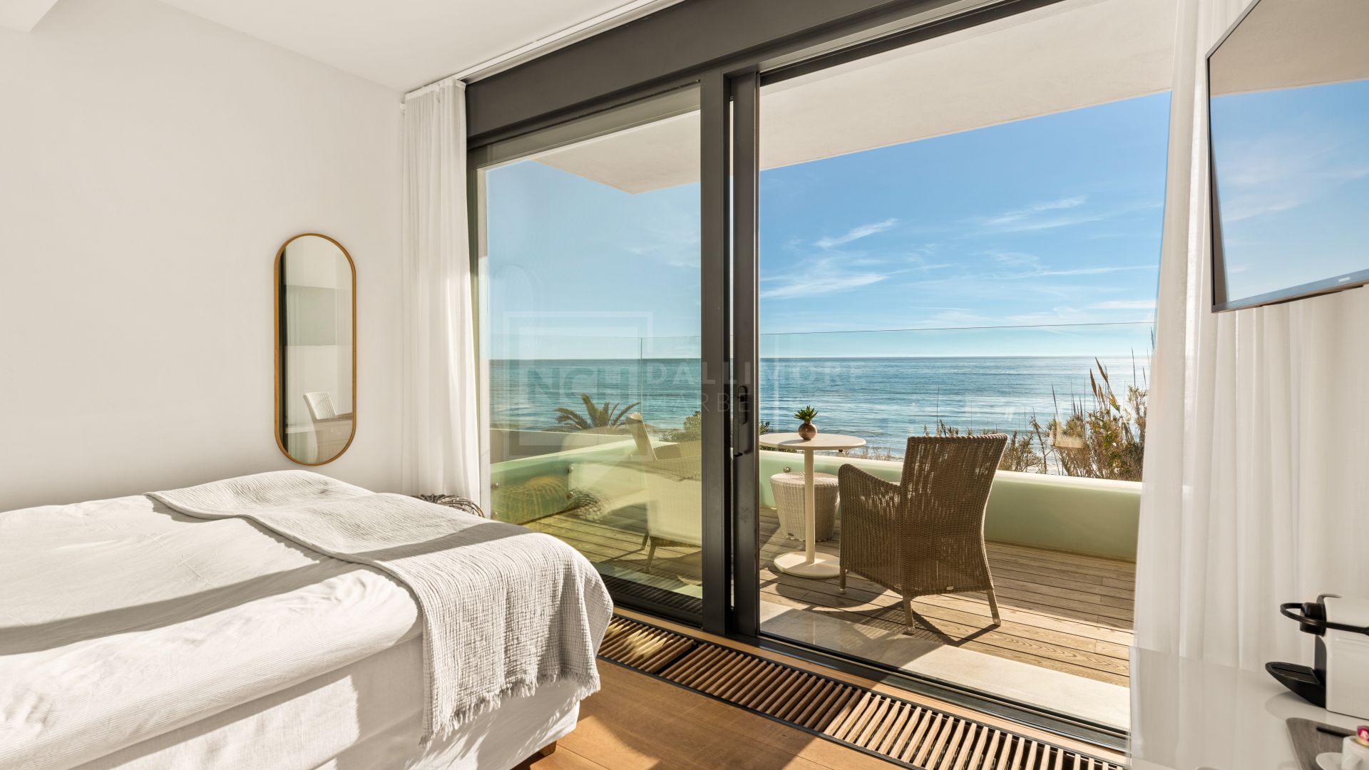 Spectacular South-East Facing Beachfront Villa with Direct Sea Access in Costabella, Marbella