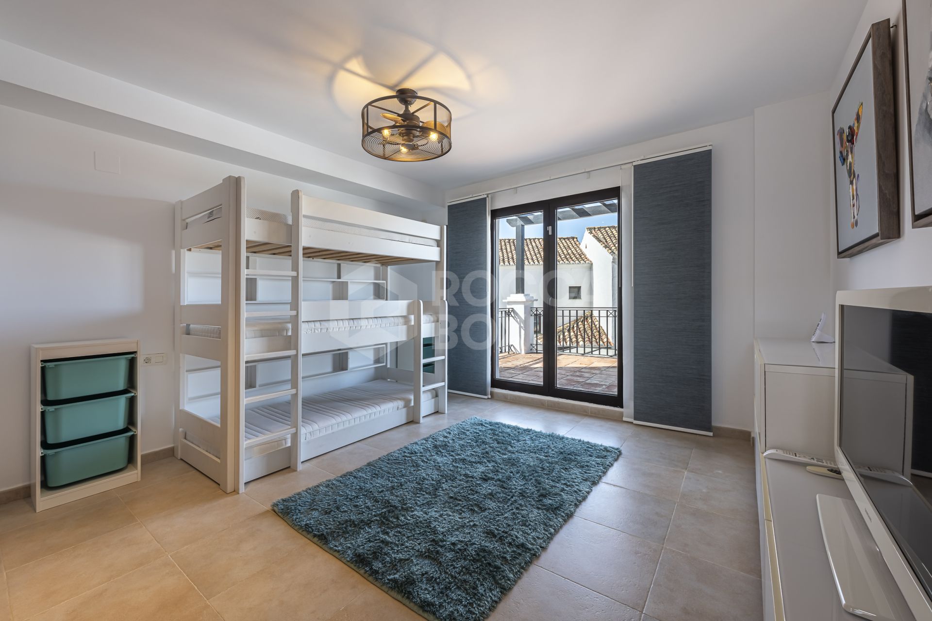 Mediterranean style south-facing triplex located in a gated community in Altos de Los Monteros, East Marbella