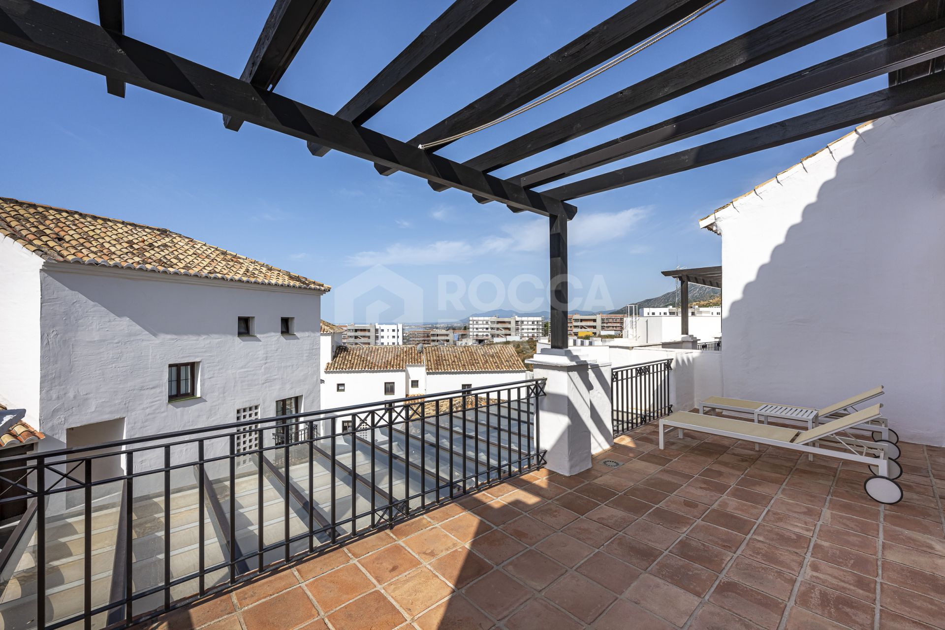 Mediterranean style south-facing triplex located in a gated community in Altos de Los Monteros, East Marbella