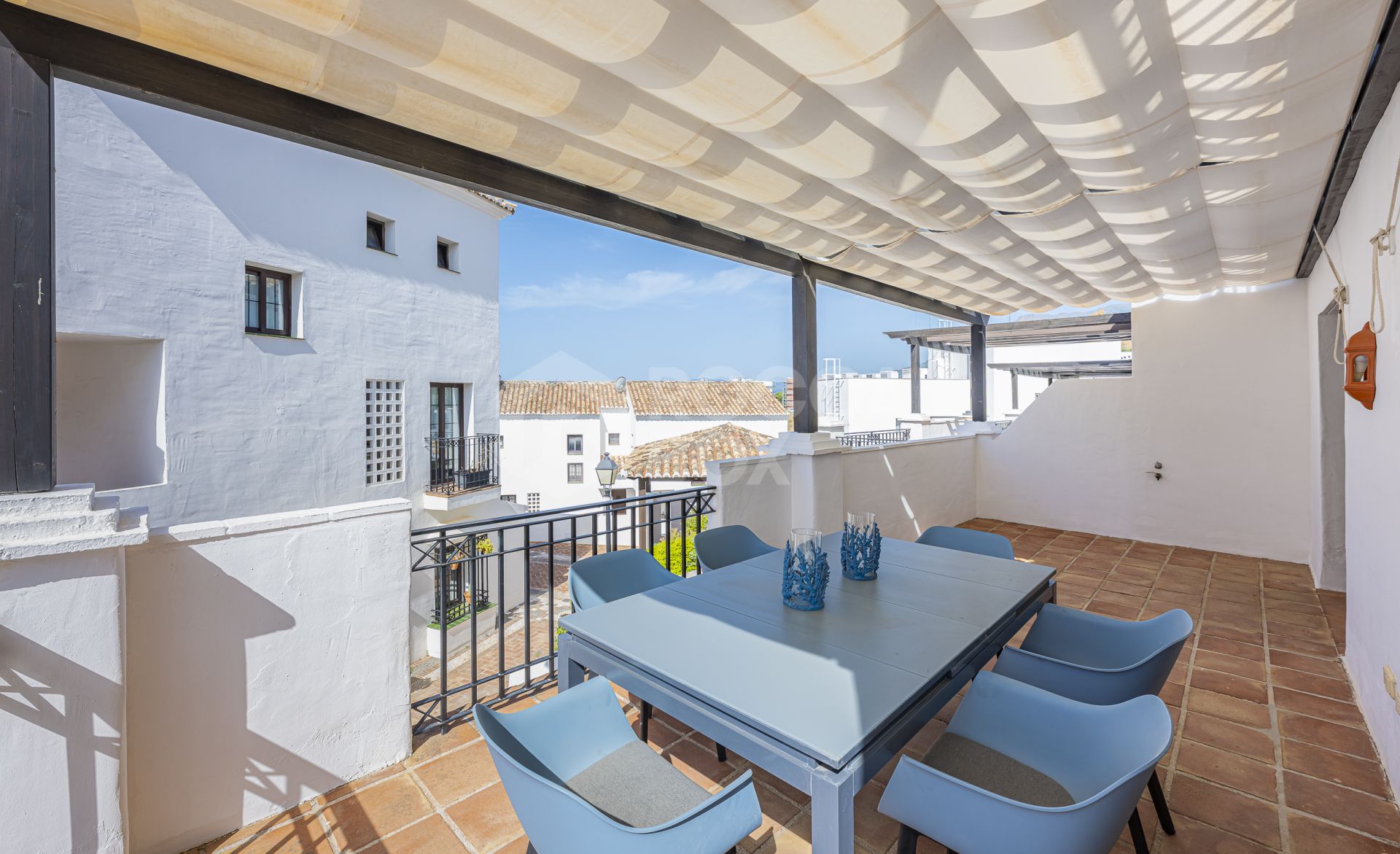 Mediterranean style south-facing triplex located in a gated community in Altos de Los Monteros, East Marbella