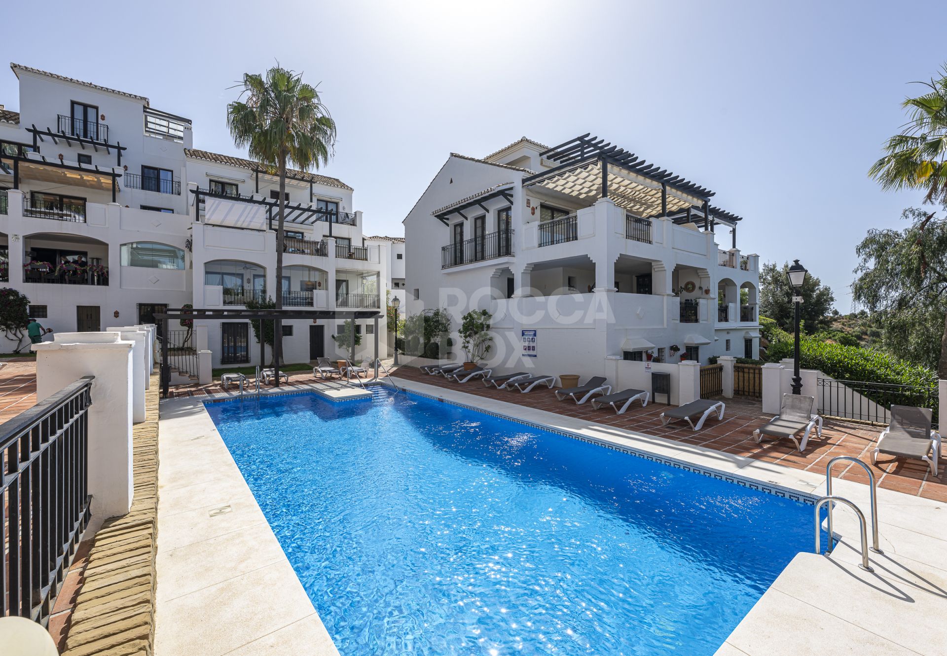 Mediterranean style south-facing triplex located in a gated community in Altos de Los Monteros, East Marbella