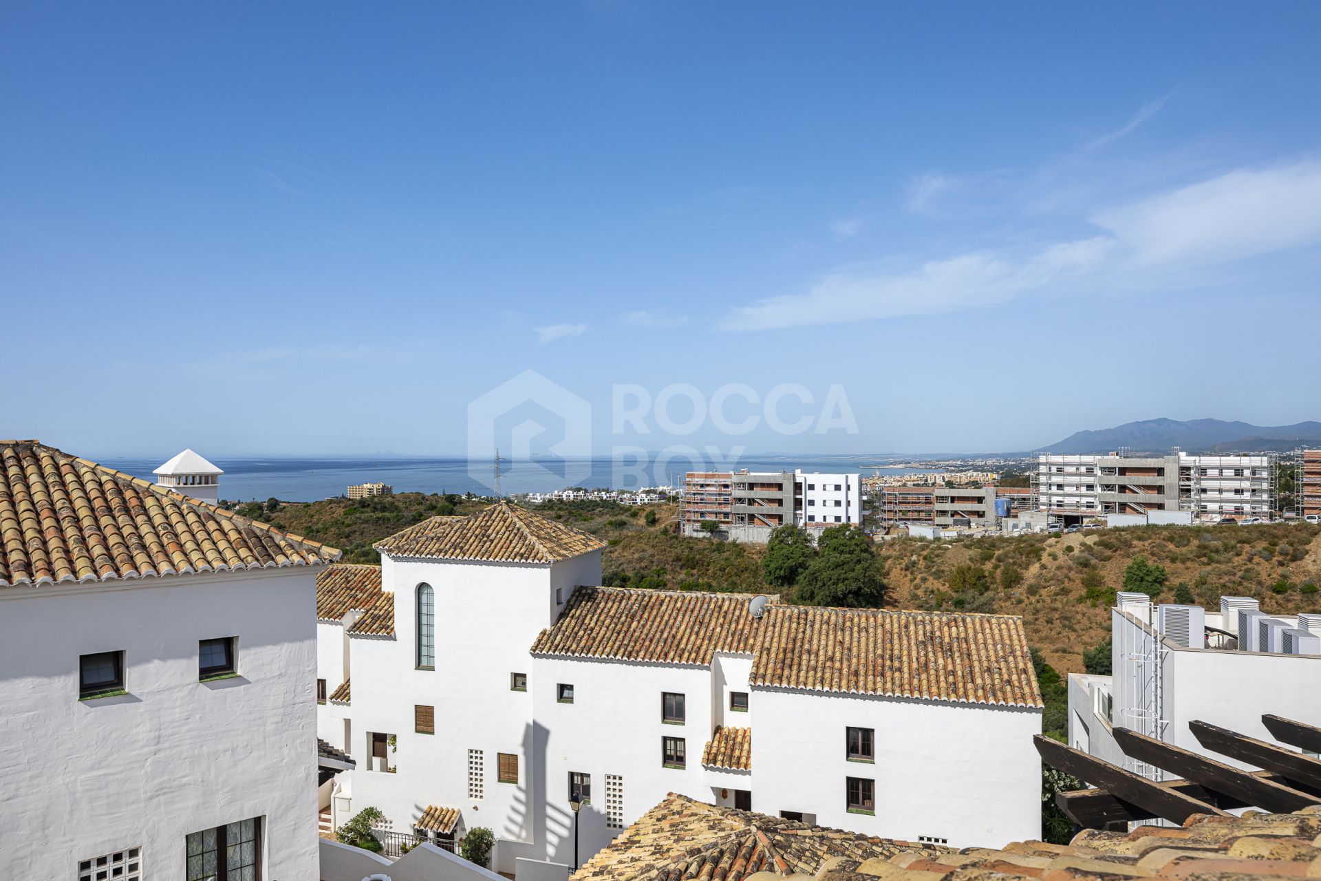 Mediterranean style south-facing triplex located in a gated community in Altos de Los Monteros, East Marbella