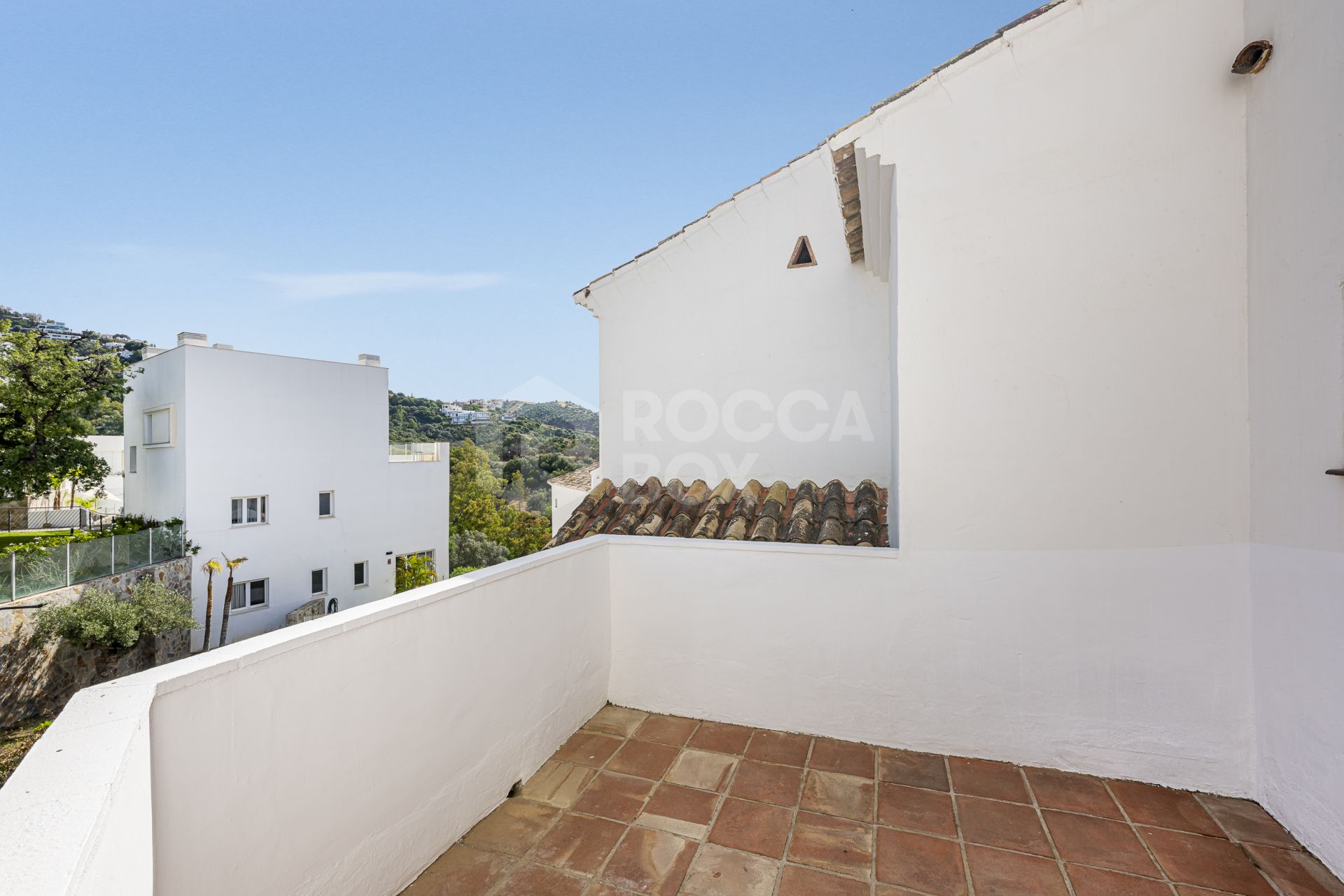 Mediterranean style south-facing triplex located in a gated community in Altos de Los Monteros, East Marbella