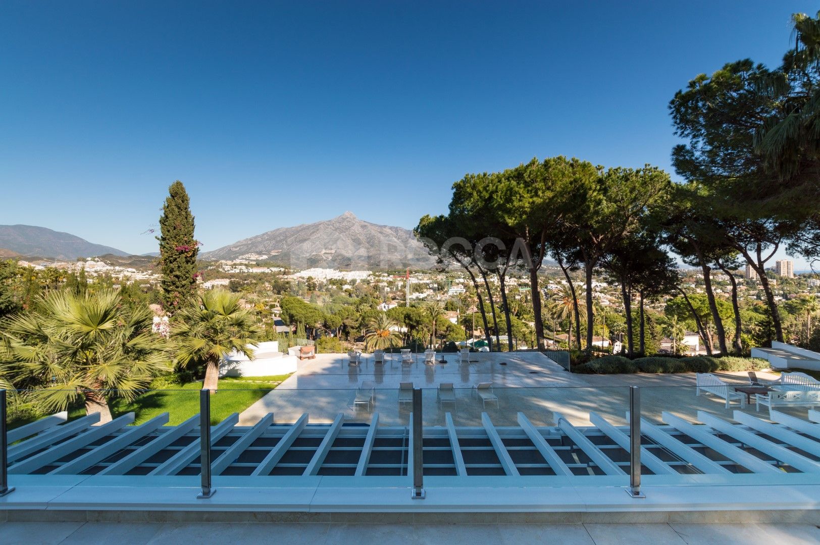 Luxury contemporary villa with spectacular sea and mountain views for short-term rent in Nueva Andalucia, Costa del Sol