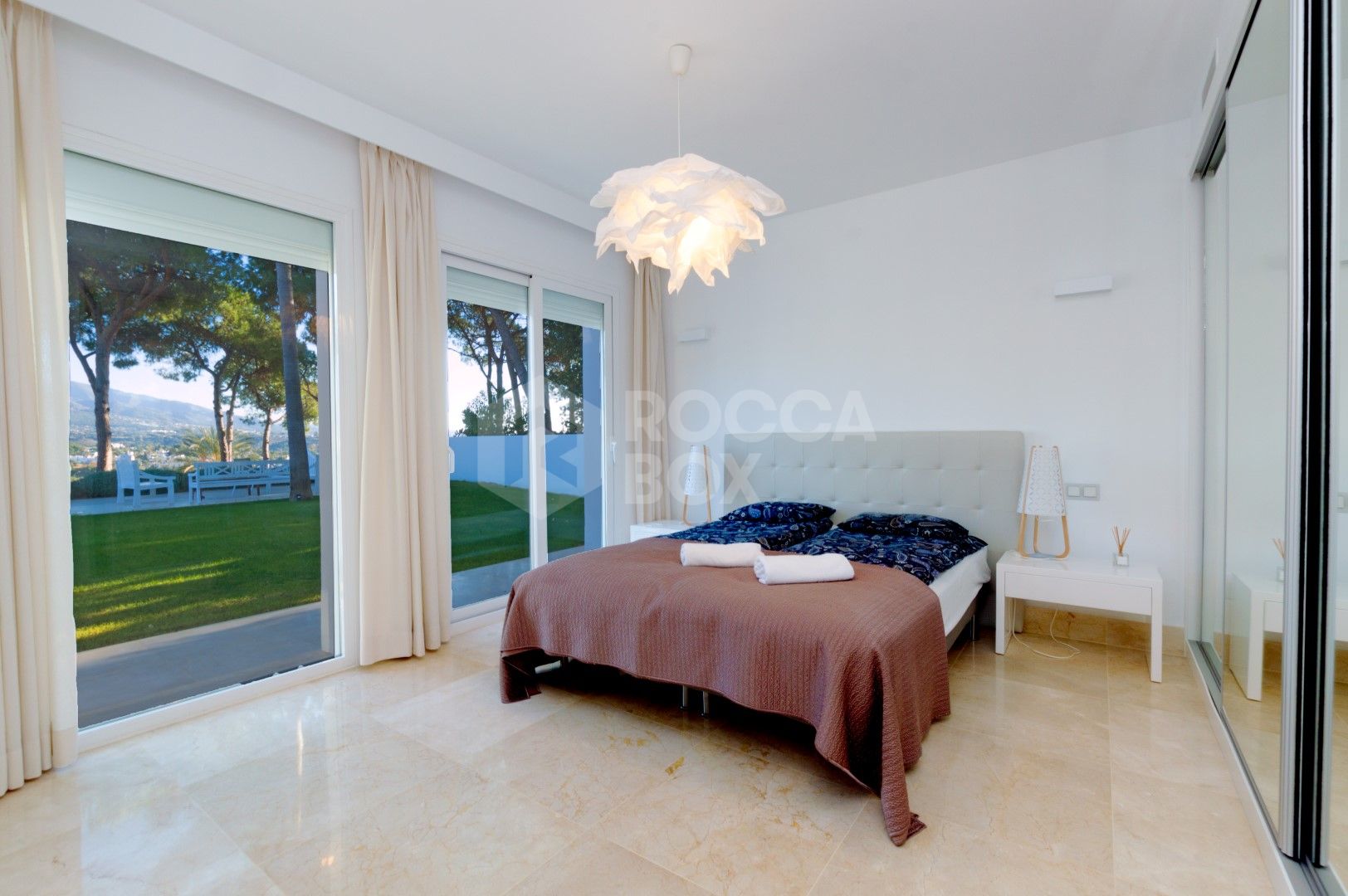 Luxury contemporary villa with spectacular sea and mountain views for short-term rent in Nueva Andalucia, Costa del Sol