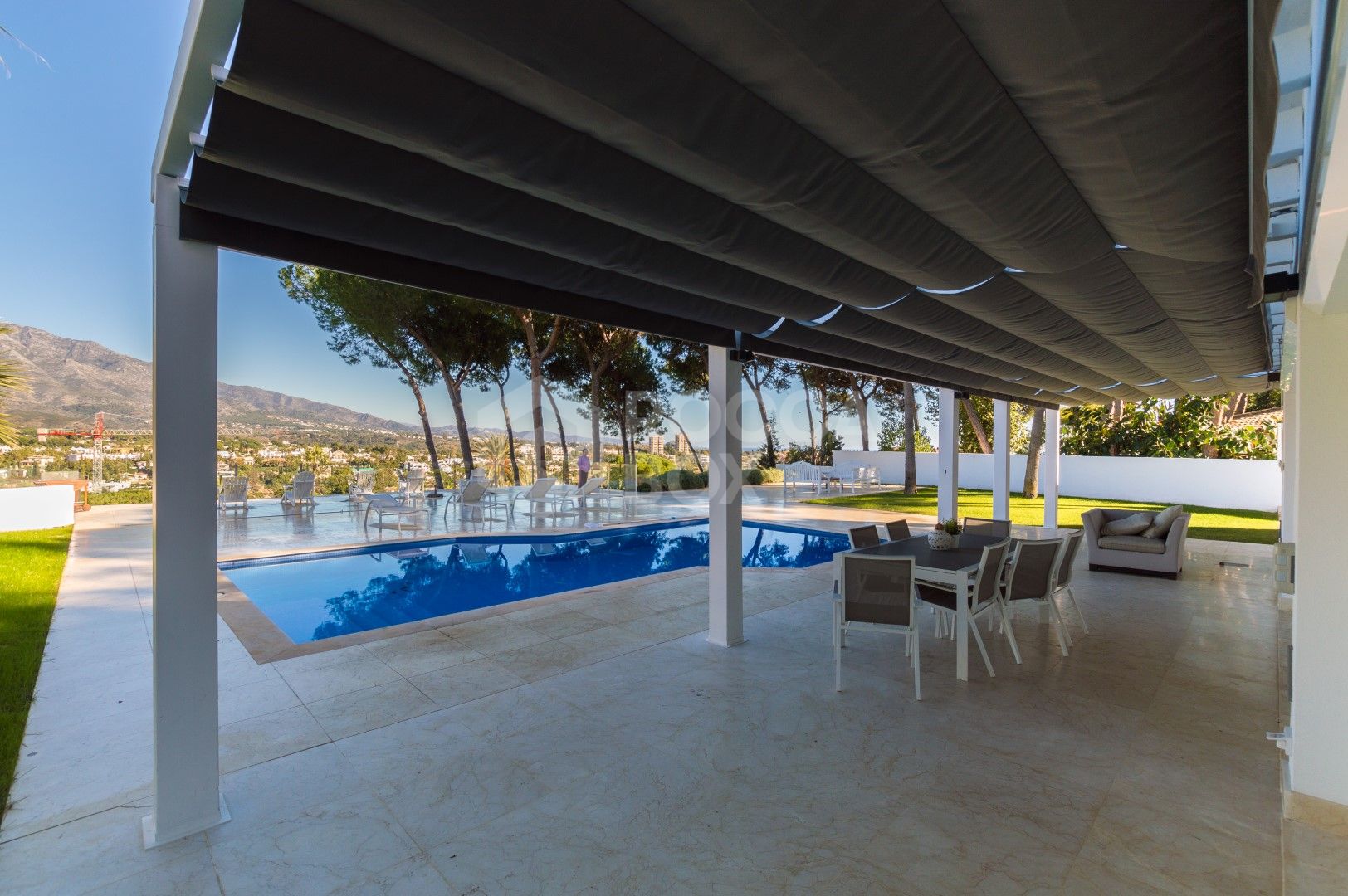 Luxury contemporary villa with spectacular sea and mountain views for short-term rent in Nueva Andalucia, Costa del Sol