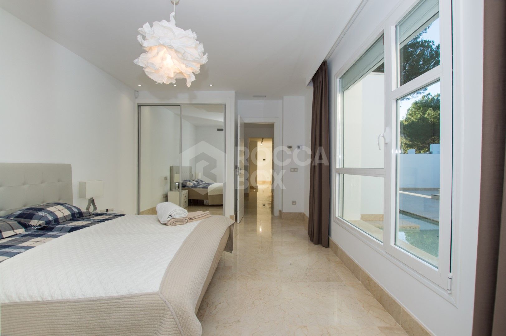 Luxury contemporary villa with spectacular sea and mountain views for short-term rent in Nueva Andalucia, Costa del Sol