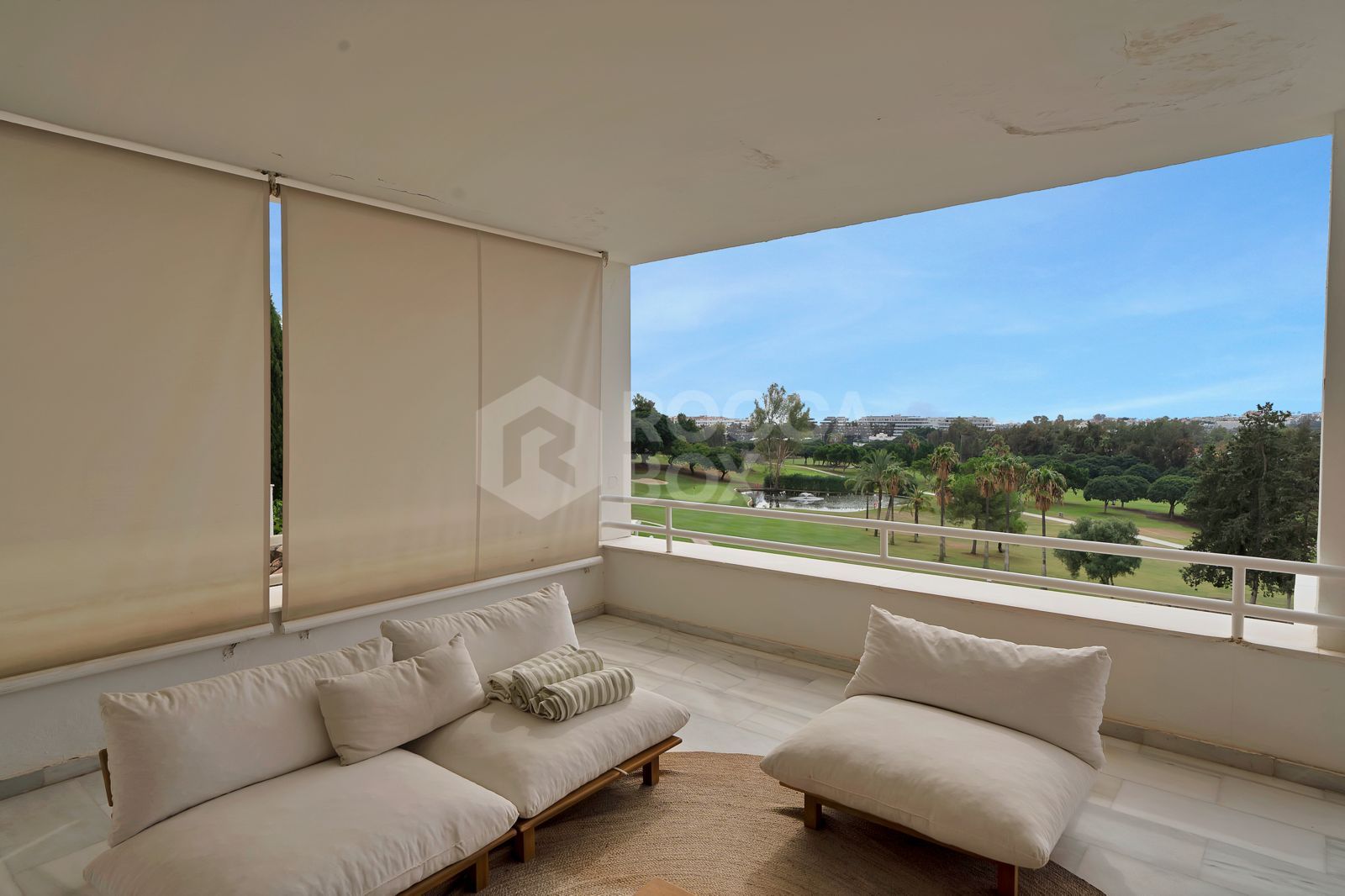 Recently renovated, west-facing middle-floor apartment within the exclusive gated community