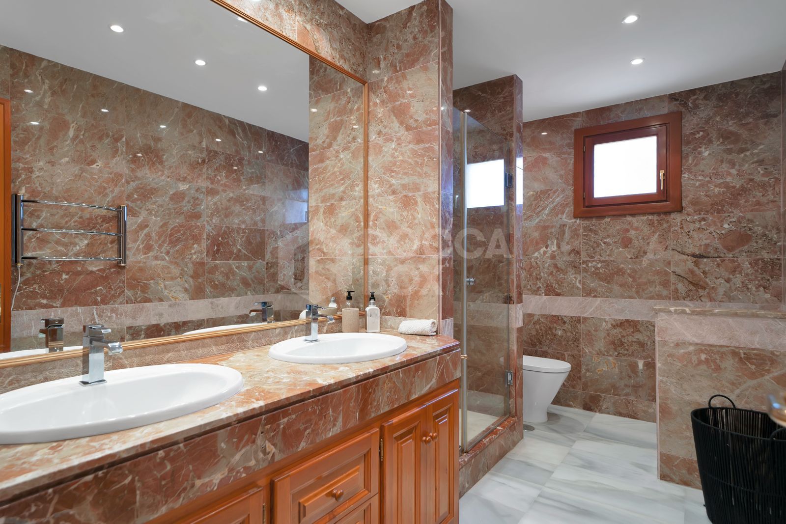 Recently renovated, west-facing middle-floor apartment within the exclusive gated community