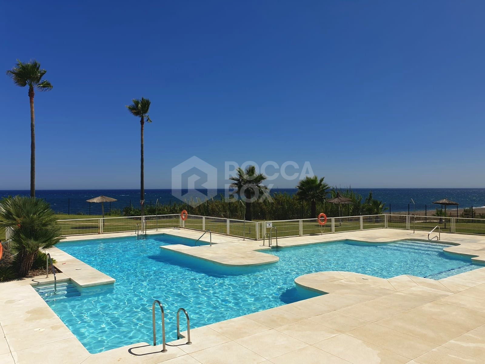 Exclusive South-Facing Beachfront Townhouse with Panoramic Sea Views