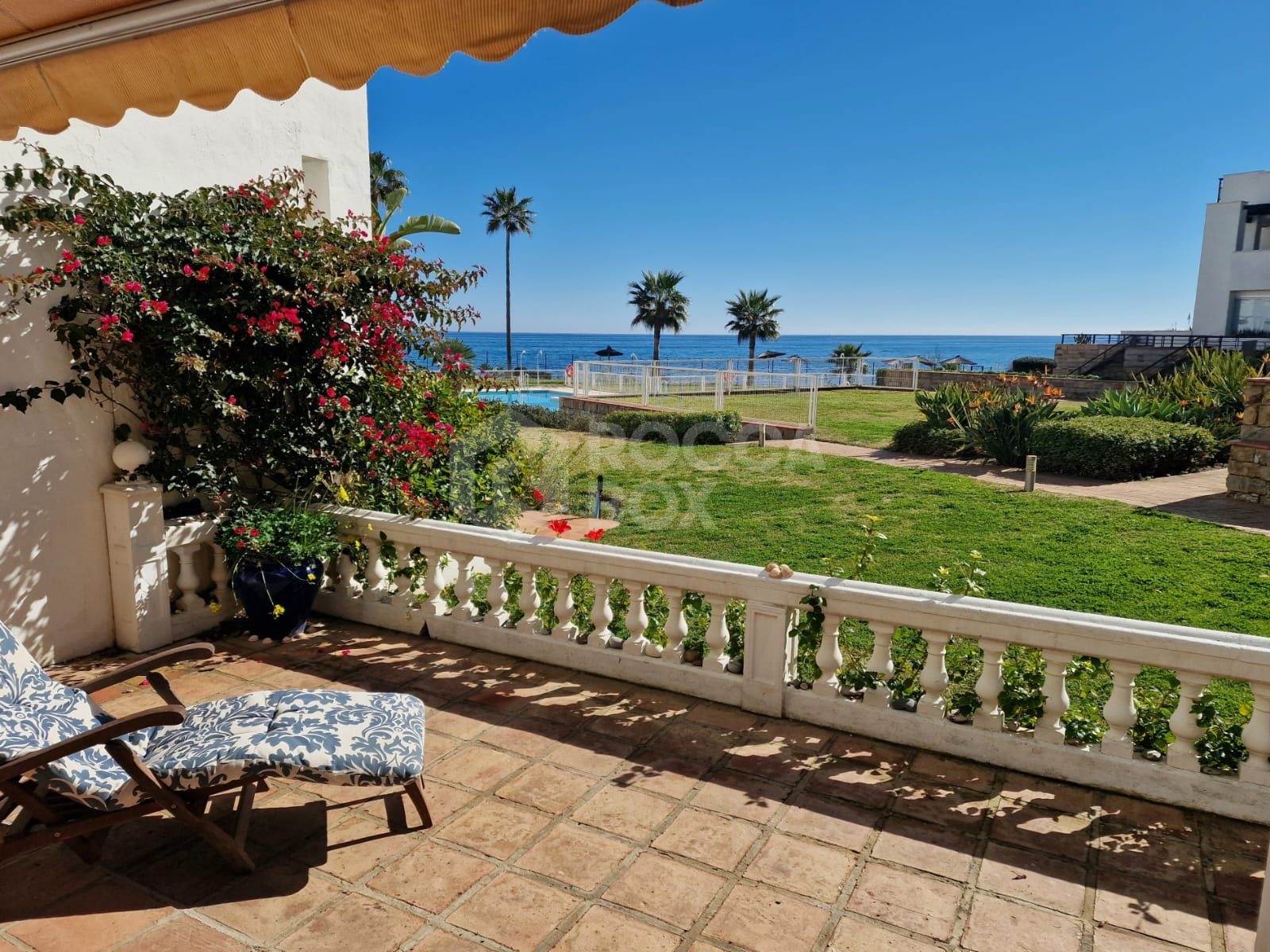 Exclusive South-Facing Beachfront Townhouse with Panoramic Sea Views