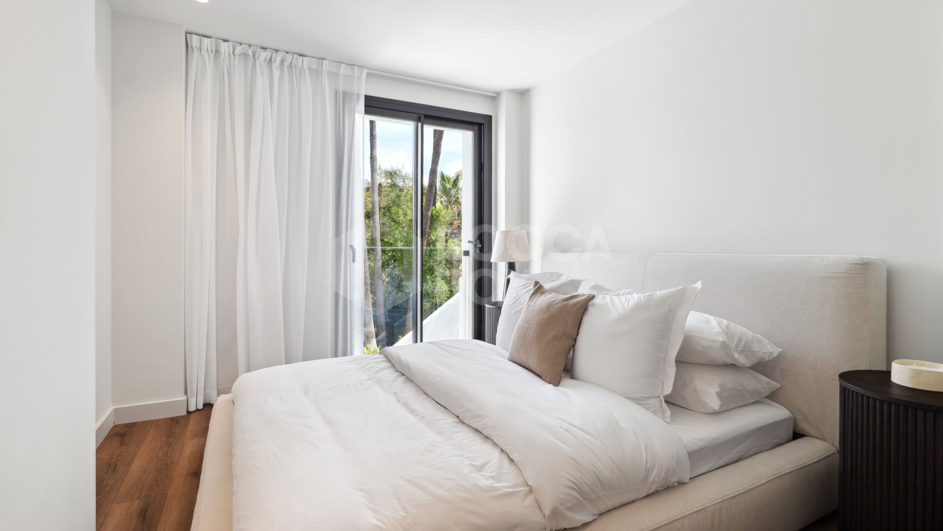 Welcome to Villa Lucalle, a contemporary masterpiece located in the picturesque grounds of Los Naranjos Hill Club in La Cerquilla, Nueva Andalucía.