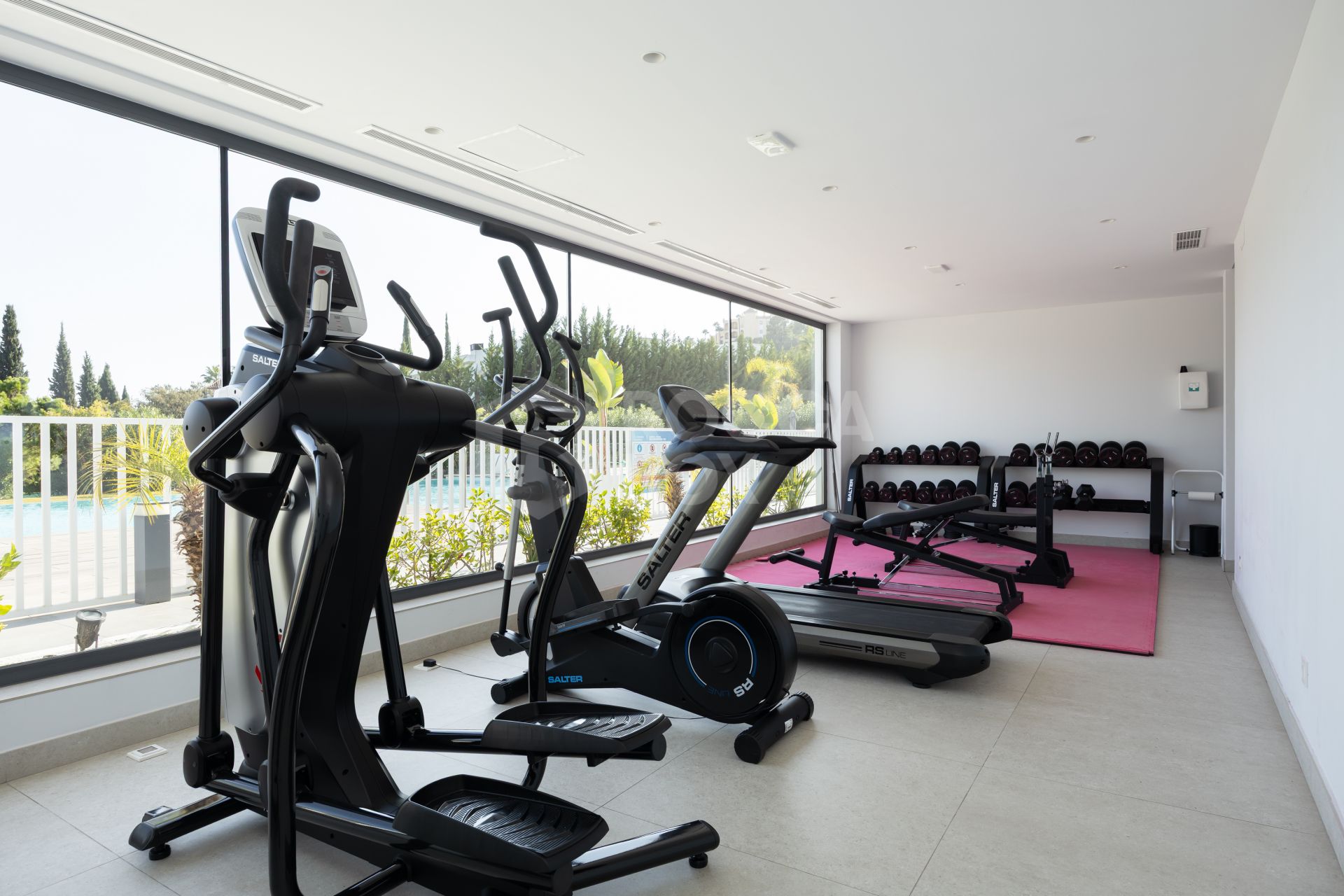 Elegant 2-bed, 2-bath apartment in Marbella’s Golf Valley with 112m² interior, 43m² terrace, luxury finishes, pools, gym, concierge & 2 parking spaces.