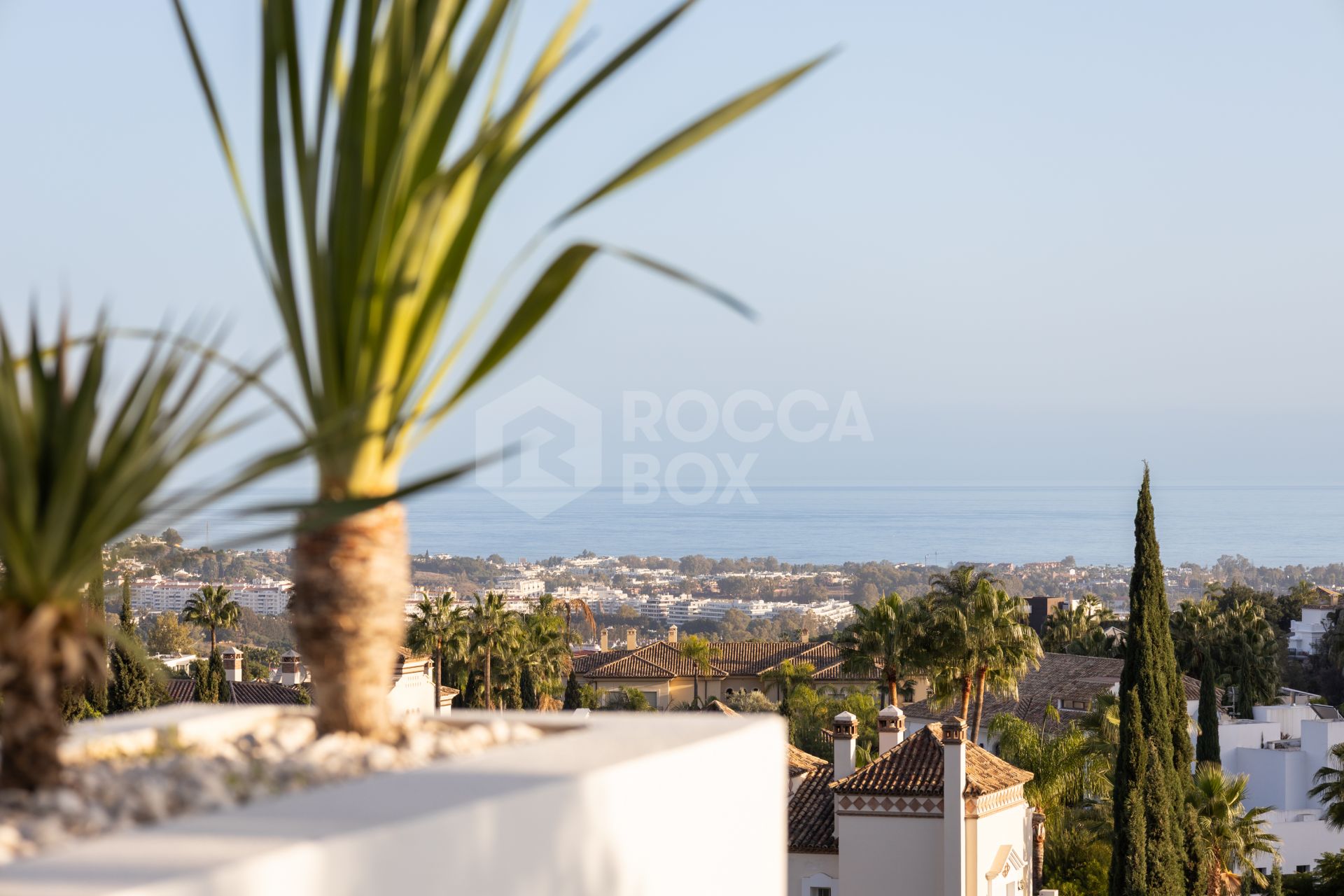 Elegant 2-bed, 2-bath apartment in Marbella’s Golf Valley with 112m² interior, 43m² terrace, luxury finishes, pools, gym, concierge & 2 parking spaces.