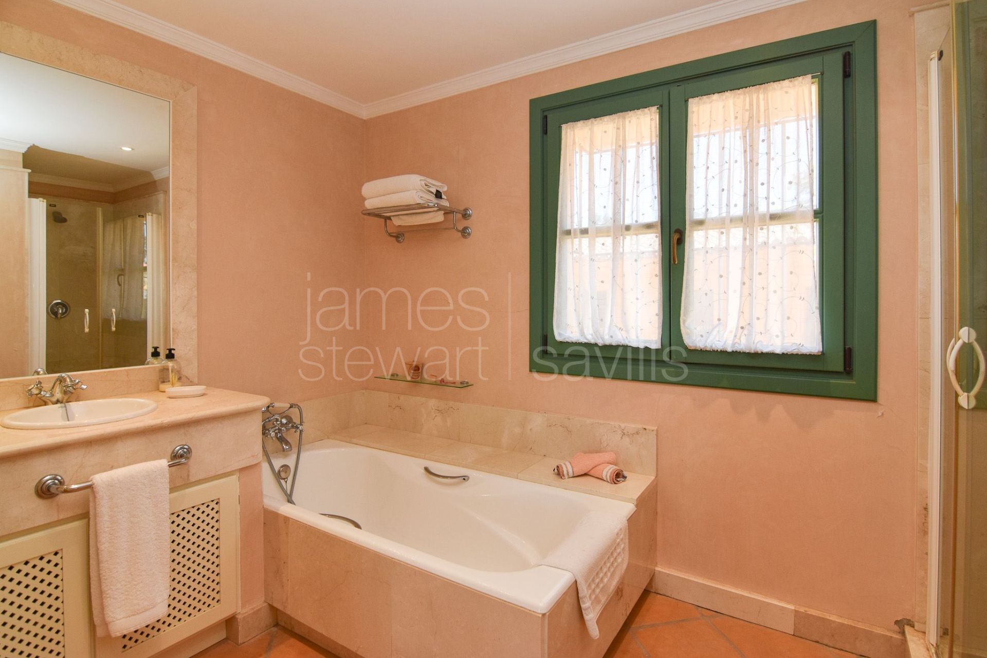 Frontline Golf townhouse with private garden in Los Cármenes, Sotogrande