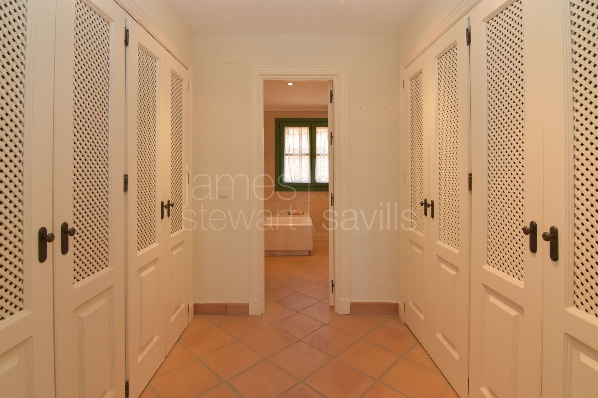 Frontline Golf townhouse with private garden in Los Cármenes, Sotogrande