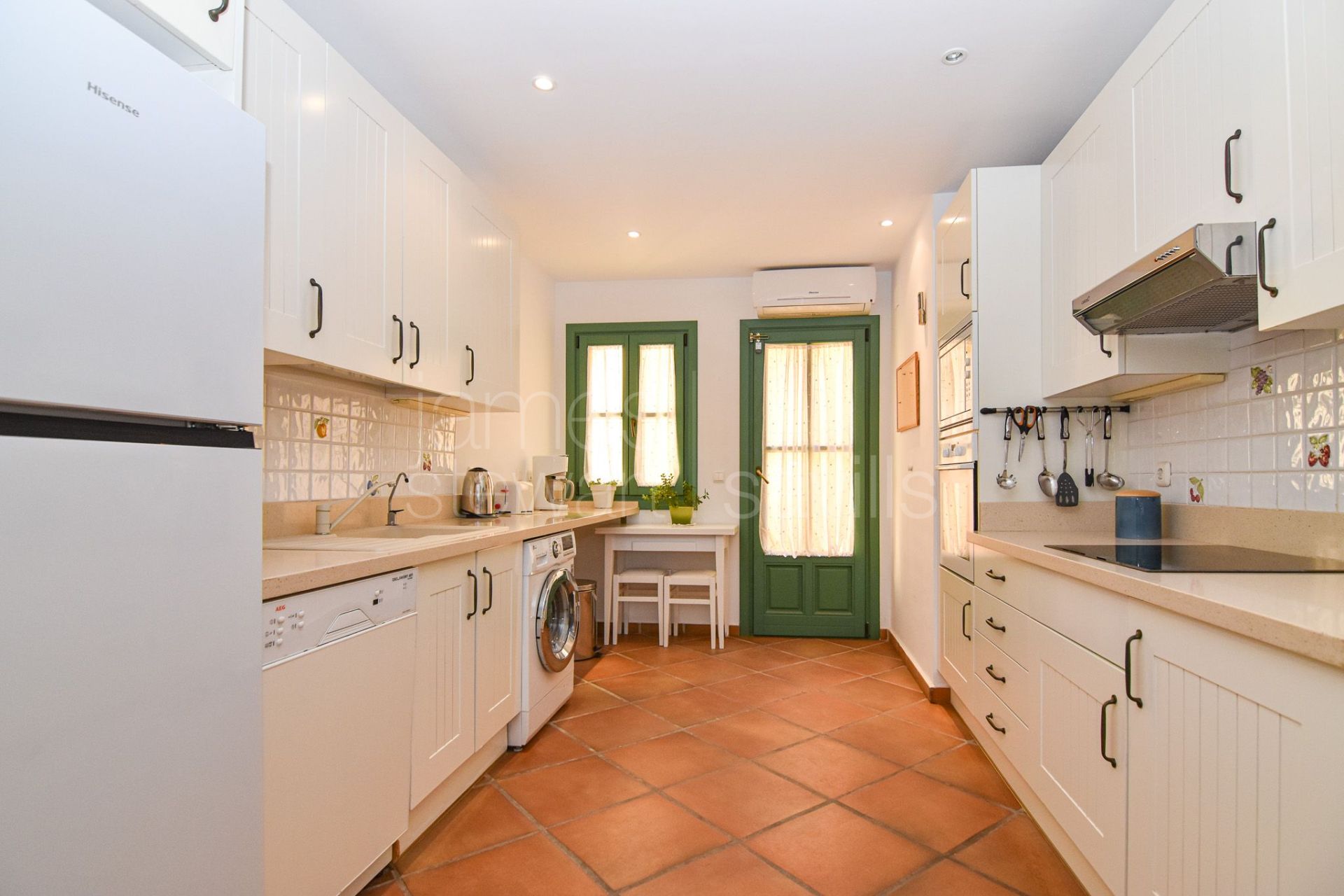 Frontline Golf townhouse with private garden in Los Cármenes, Sotogrande