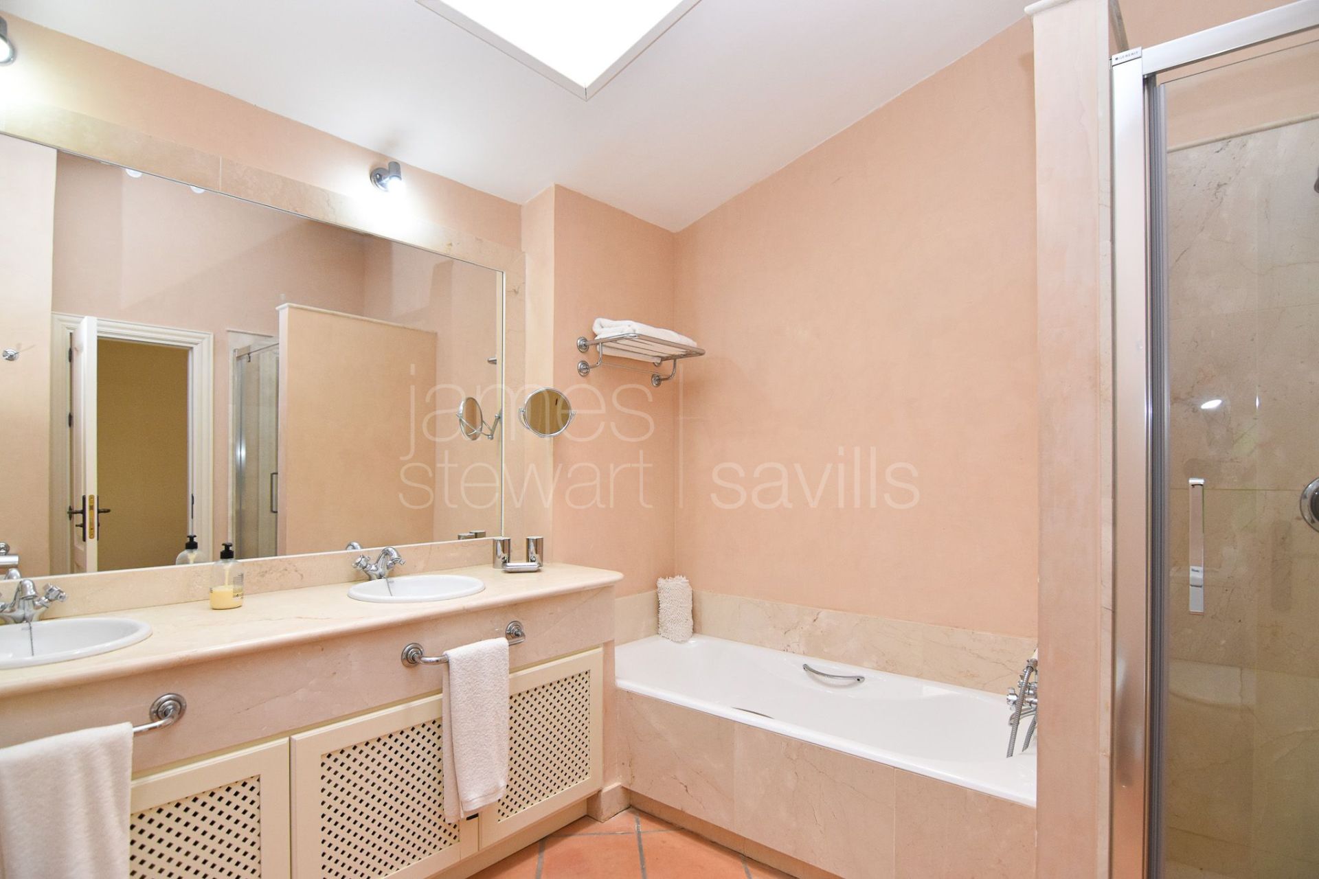 Frontline Golf townhouse with private garden in Los Cármenes, Sotogrande