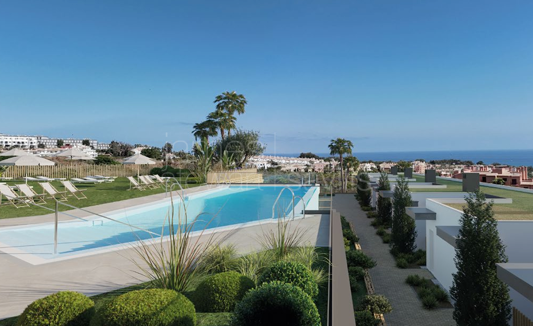 Adosados de obra nueva de 3 dormitorios con vistas al mar en venta en Bahia de las Rocas, Manilva