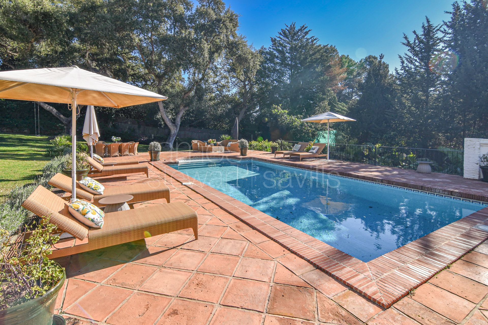 A charming and pretty Andalucian villa on a large frontline Royal Valderrama Golf Club plot