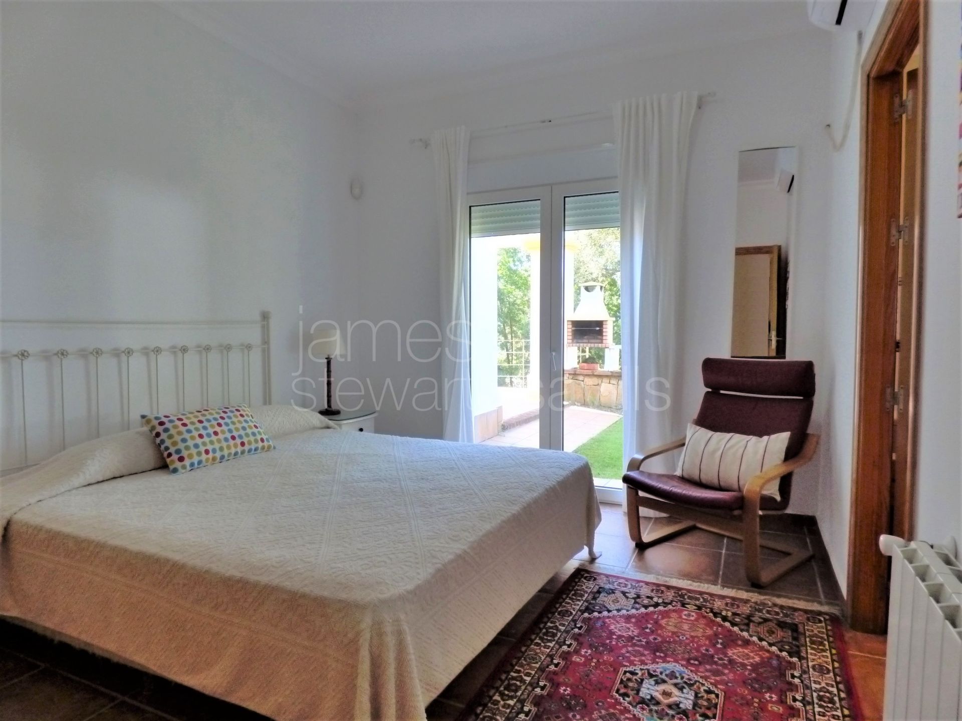 Andaluz style villa on a lovely cork oak filled plot in a quiet road in the Valderrama area