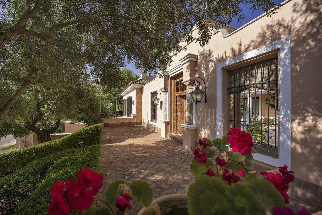 Andalusian Cortijo style villa front line golf in San Roque Club course.