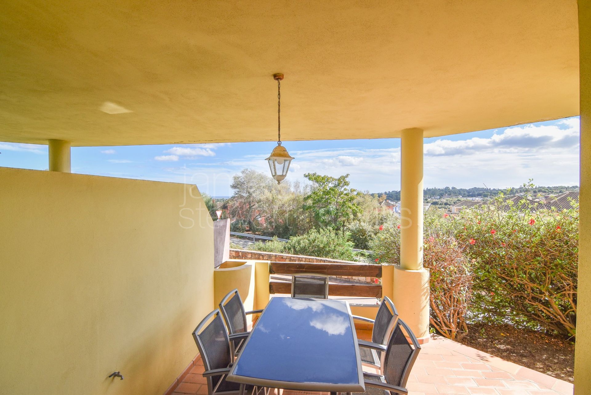 Three-Storey Townhouse with Solarium, Sea Views, and Versatile Basement Space in Hoyo 1, Pueblo Nuevo de Guadiaro.