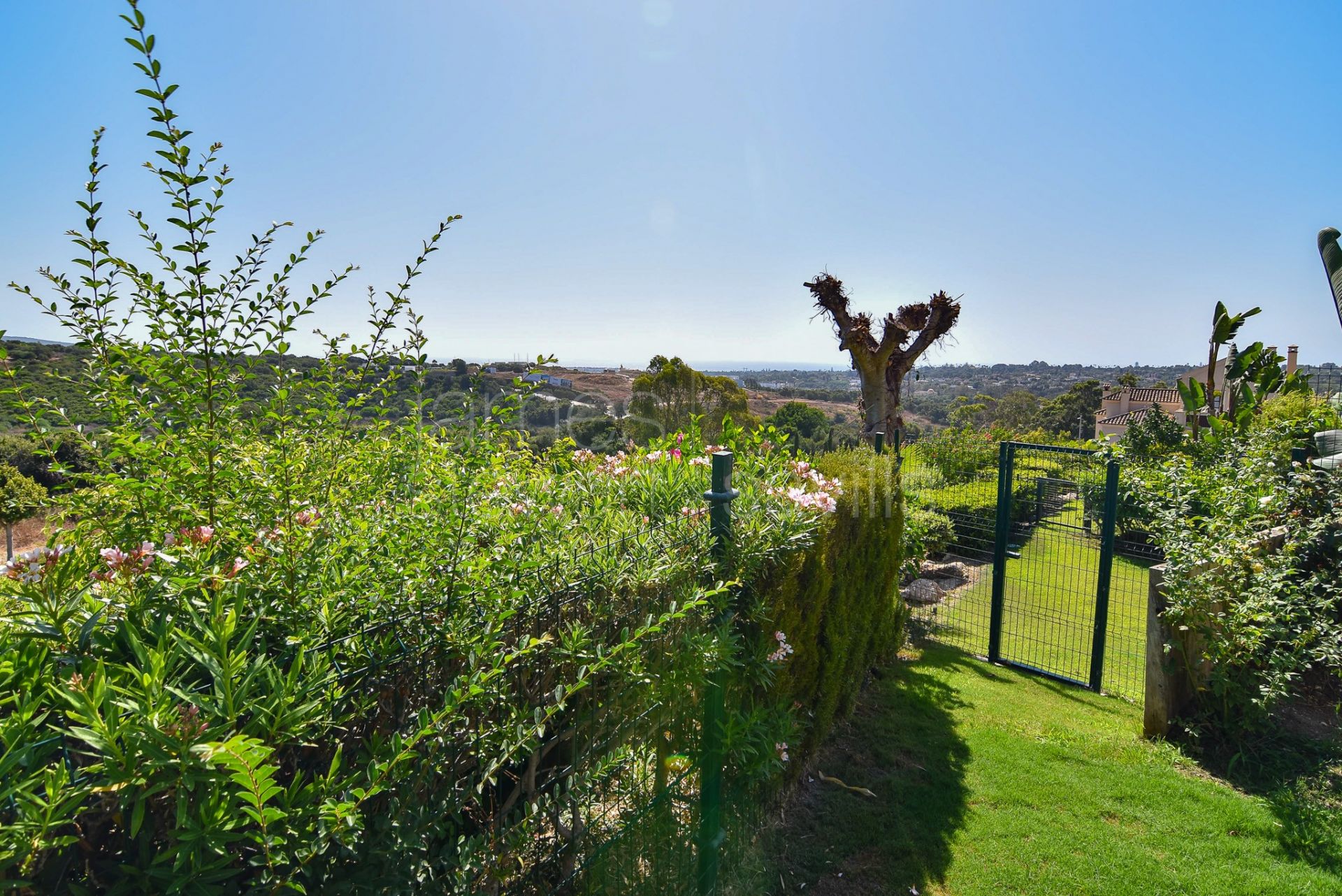 Charming Townhouse with Views and Private Garden in Cortijos de la Reserva