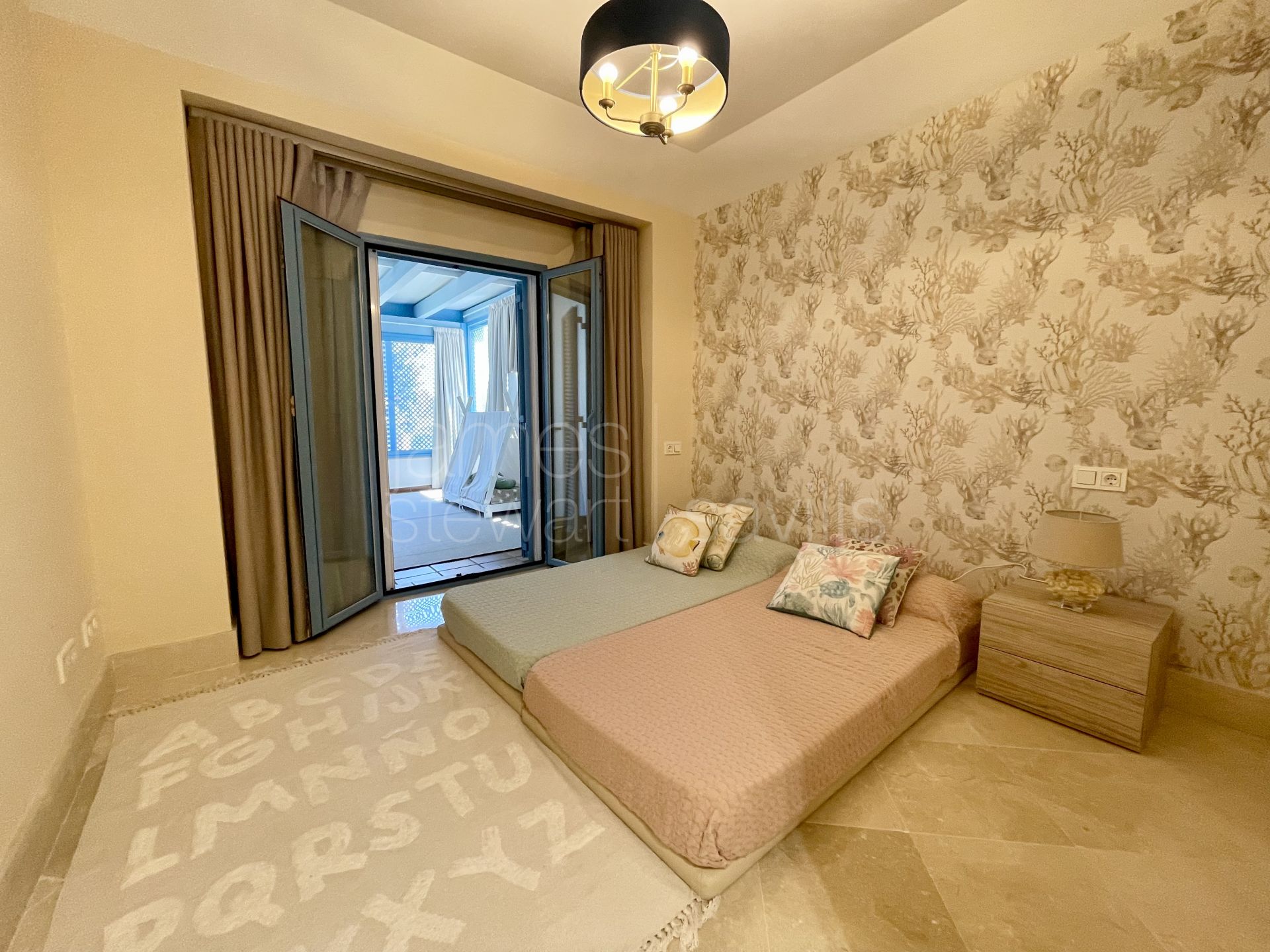 Spacious Ground Floor Marina Apartment with Canal Views and Large Terrace in Sotogrande
