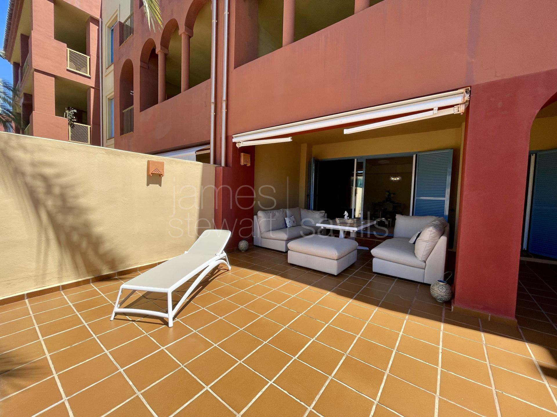 Spacious Ground Floor Marina Apartment with Canal Views and Large Terrace in Sotogrande