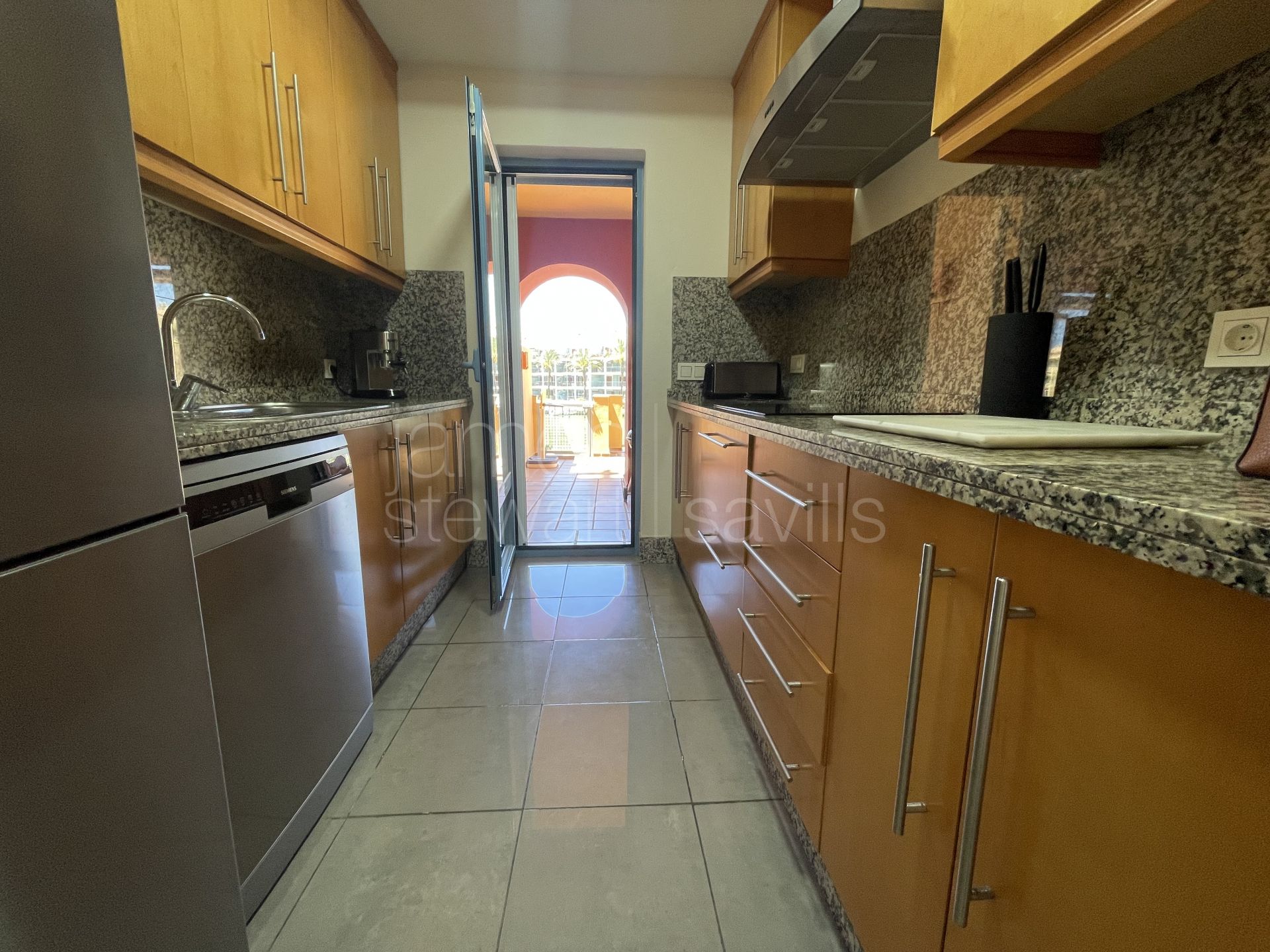 Spacious Ground Floor Marina Apartment with Canal Views and Large Terrace in Sotogrande