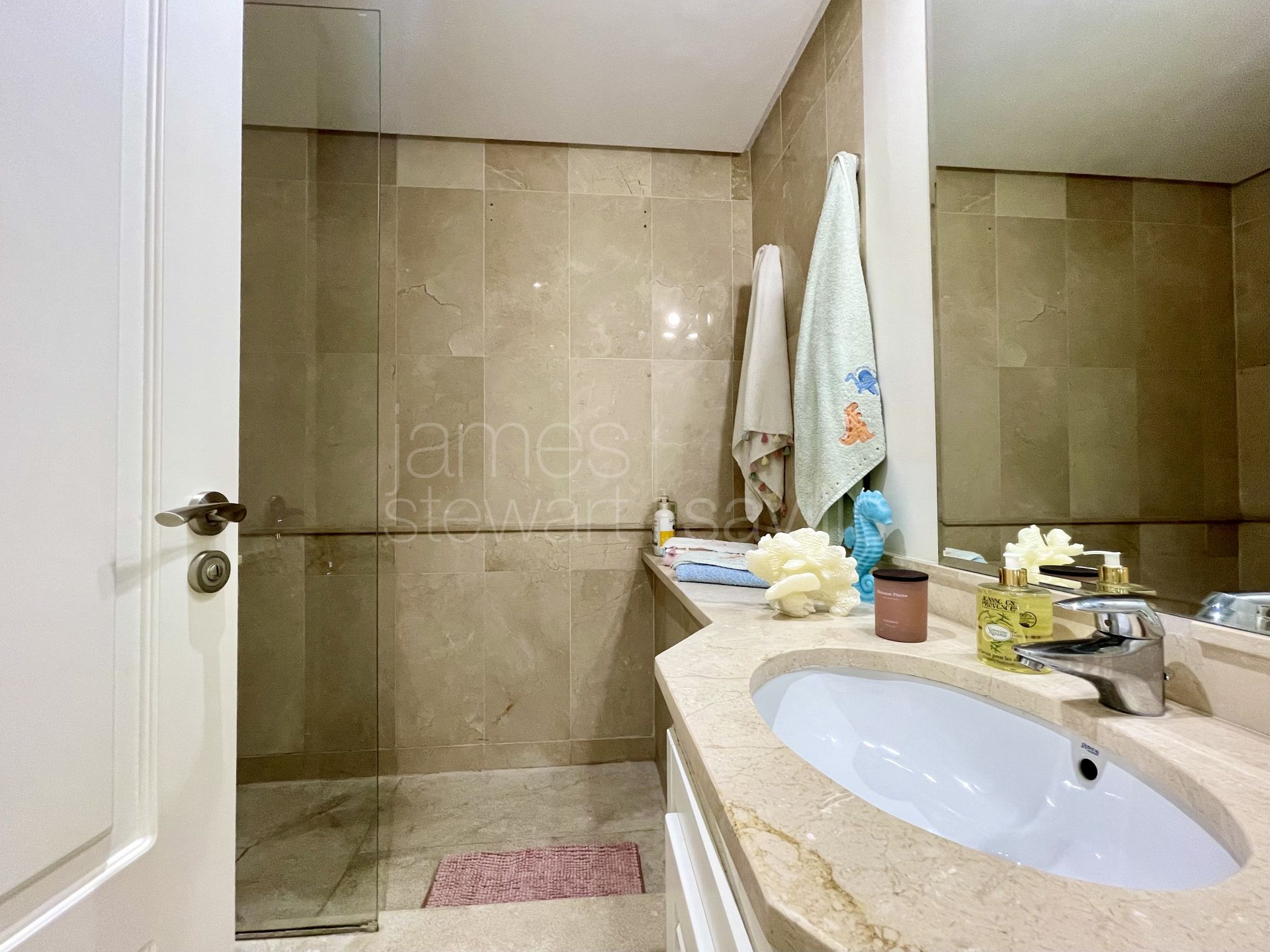 Spacious Ground Floor Marina Apartment with Canal Views and Large Terrace in Sotogrande