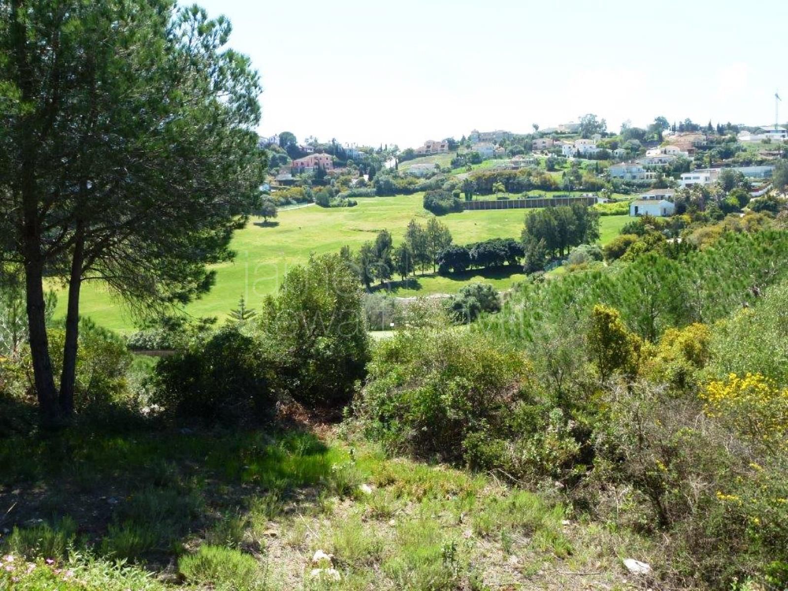 South facing plot with Almenara golf views very close to the International School