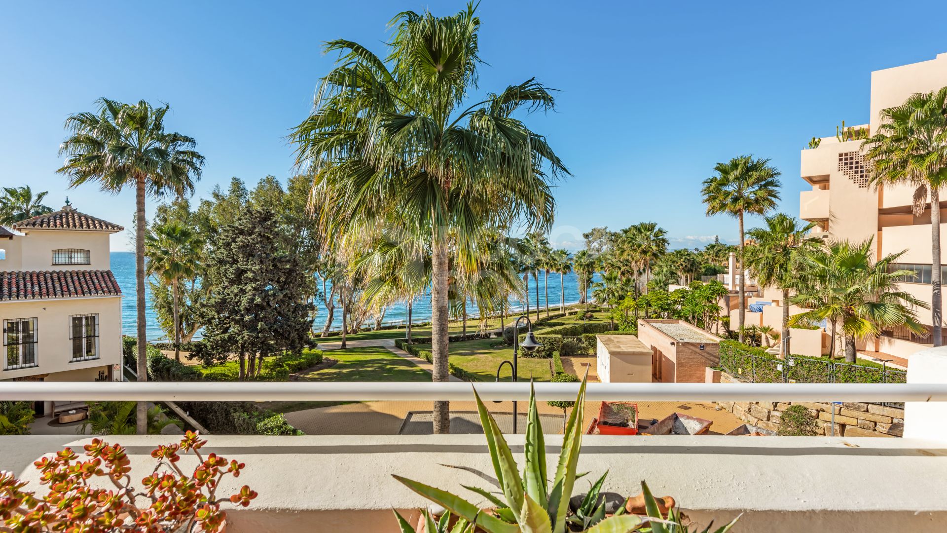 Exceptional Value! Stunning 3 bedroom townhouse for sale in front line beach community in Estepona's New Golden Mile