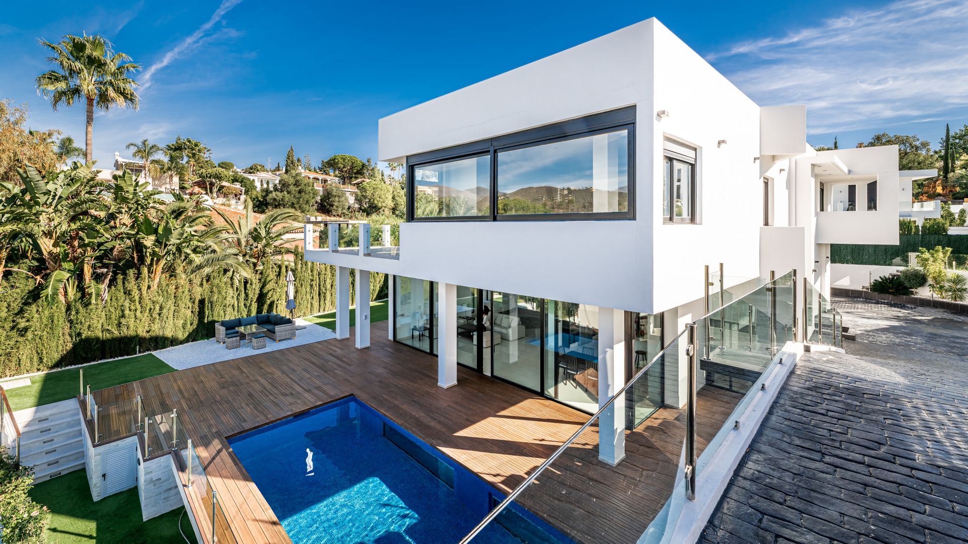 Modern villa with indoor pool and green views | Engel & Völkers Marbella