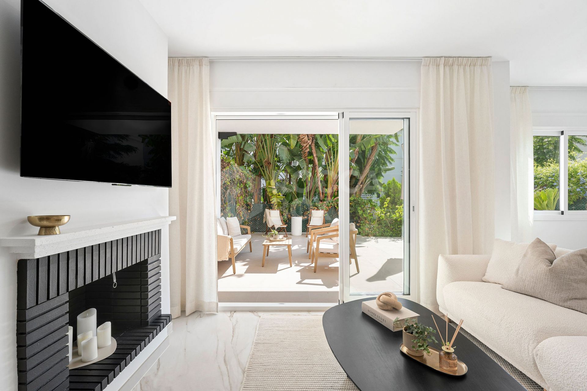 Welcome to this beautifully renovated ground floor apartment in Guadalmina Baja – Steps from the Beach and Golf!